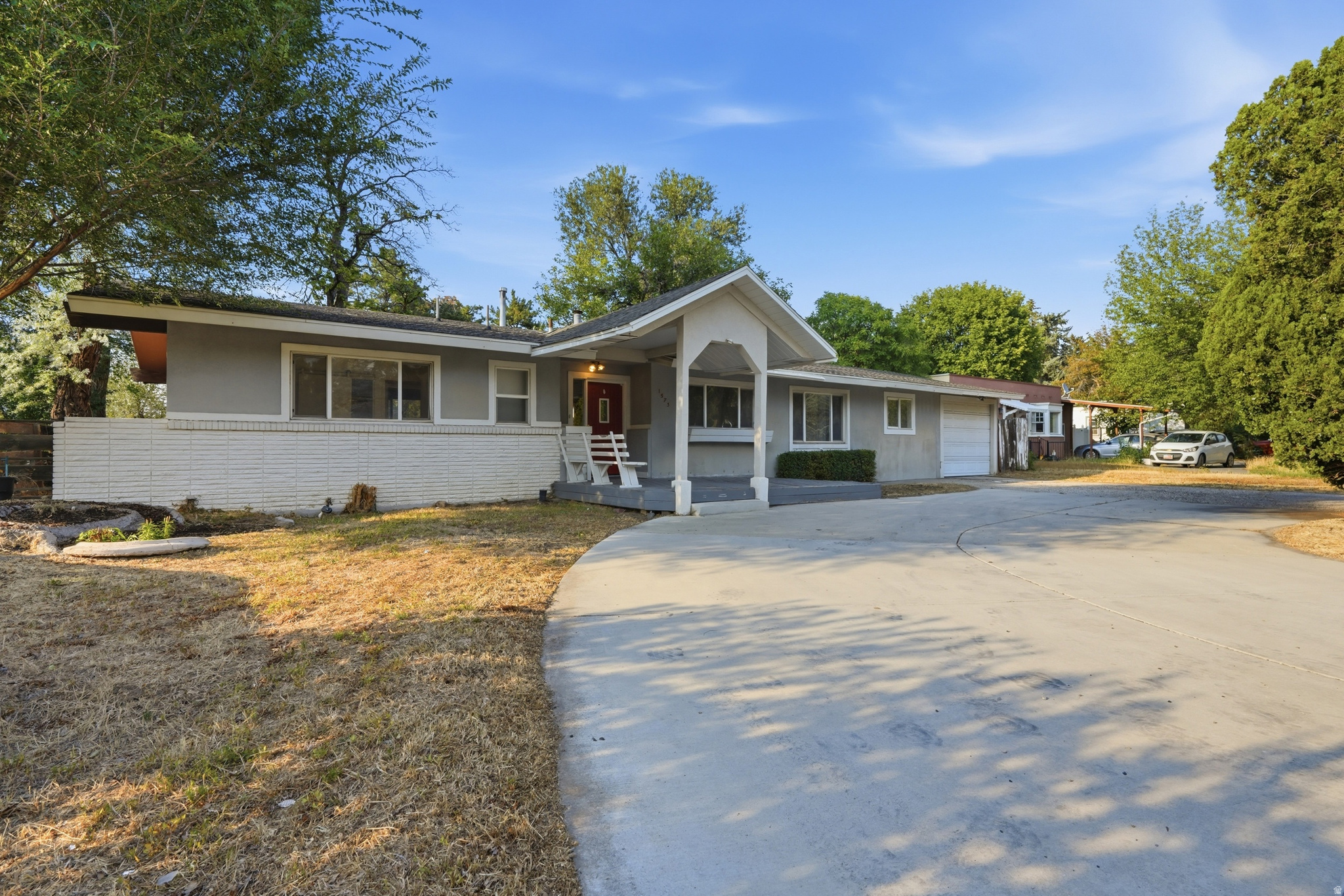 Located in one of the East Bench's most coveted neighborhoods, this 4-bedroom property represents a rare, blank-canvas opportunity priced below market value. Situated on a flat 0.26-acre lot, this home is primed for an ambitious investor looking for a high-return flip, or a savvy buyer wanting to build immediate equity with a fixer-upper by customizing their forever home.  The footprint offers a functional layout ready for a modern transformation. The large yard provides the ultimate canvas for an expansive outdoor living area or the ultimate backyard retreat. Bring your contractor, your design mood boards, and your vision. Find the untapped potential in an A+ location of Holladay. Shopping, gym, freeway access and local shops all nearby. Sold as-is. Figures are provided as a courtesy, buyer and buyers agent to verify all information.