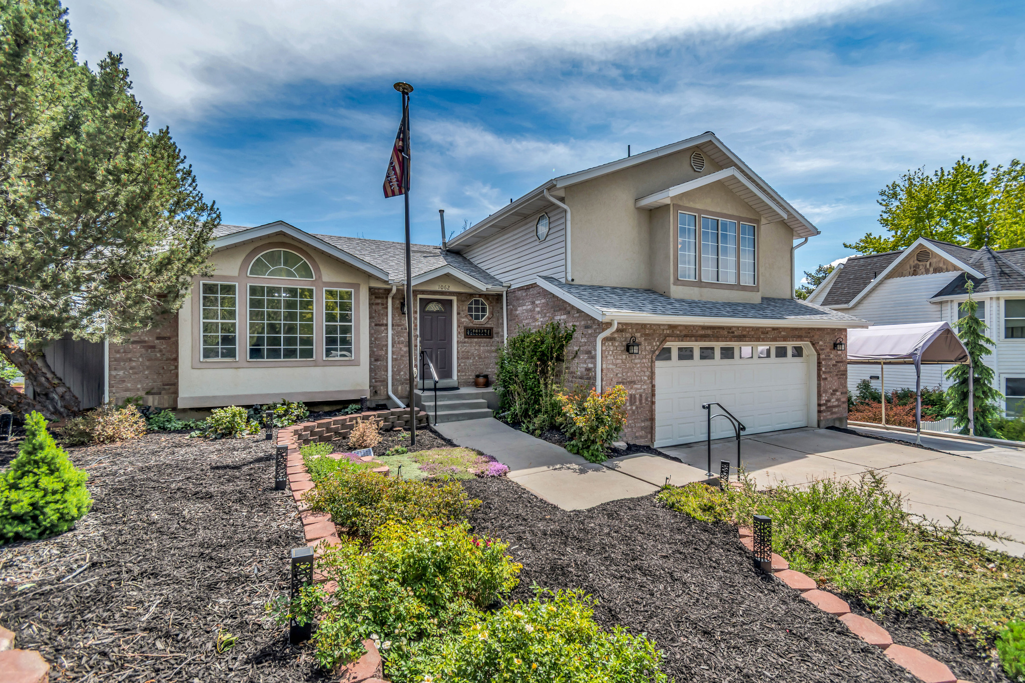 New Sod Installed!  Wonderful and well maintained home in beautiful and quiet Kirtland Estates neighborhood with no through streets!!! Views of the Mountains and Valley from the back Deck. GREAT schools (Choice of Pleasant Grove or Timpanogos High Schools).  10 minute Walk to the Lindon Temple. Easy access to the Murdock Canal Trail System, Lindon Trail System, Bonneville Shoreline Trail system and Dry Canyon,  New paint throughout the house! New flooring! Two luxurious Decks with brand new Hot Tub installed and included in the purchase. Majority of yard mature Xeriscaped landscaping with VERY LOW MAINTENANCE. . .New sod was installed in the backyard with Sprinklers.   6 Bedroom, 3 bath, Oversized 2 car garage. Don't miss an opportunity to live in Lindon's Kirtland Estates. Call for your private showing.