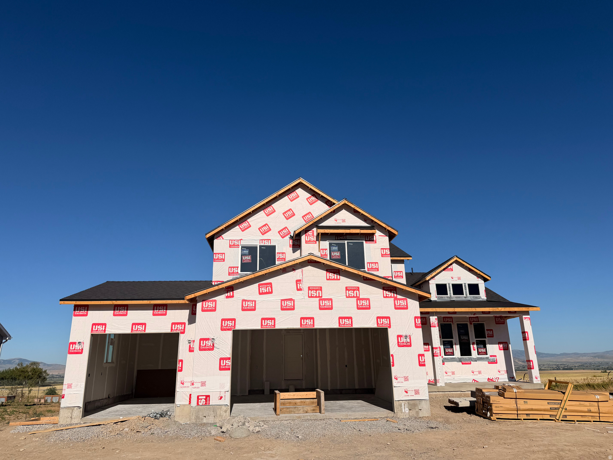 This Beautiful New Home has the WOW factor! Located in a prime new subdivision on the northeast bench in Smithfield, you will enjoy beautiful views all around. This Midway floor plan is a showstopper! The open floor plan has a grand feel as the great room opens up to 18' ceilings. A main level suite with a separate tub/shower and a large walk in closet and lots of room to grow. This home will be finished first part of September.. Come and see this gem as it gets finished up! Or call and build any home on one of our available lots. Finishes may be different from pictures as they are of a different home/same floor plan.