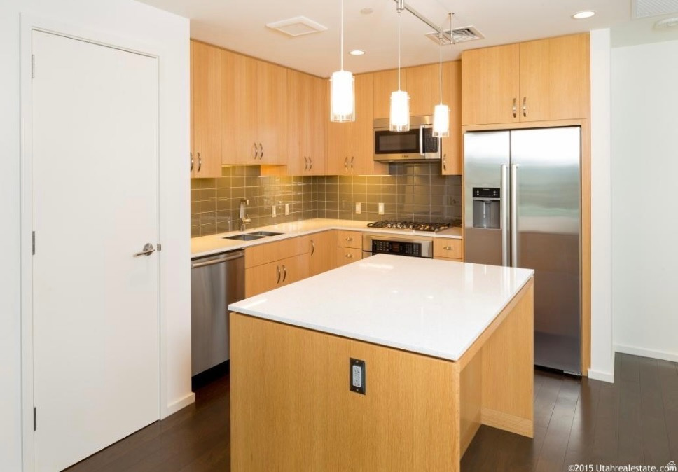 Luxury high-rise living in the heart of downtown Salt Lake City! This beautifully maintained 1-bedroom, 1-bath condo offers approximately 854 square feet of bright, open living space with expansive west-facing windows showcasing stunning city skyline and mountain views. Located in the highly desirable Regent at City Creek, you'll enjoy an unbeatable walkable lifestyle just steps from City Creek Center, grocery stores, restaurants, coffee shops, theaters, concerts, sporting events, and the city's vibrant arts and entertainment district.  Community amenities include a resort-style pool and hot tub, fitness center, club and social rooms, secure building access, professional on-site management, reserved parking, and private storage. Beautiful landscaped plazas, flowing streams, waterfalls, and fountains create a peaceful setting right outside your door. Conveniently located near the University of Utah, Salt Lake International Airport, TRAX, and world-class ski resorts, this is downtown living at its finest.