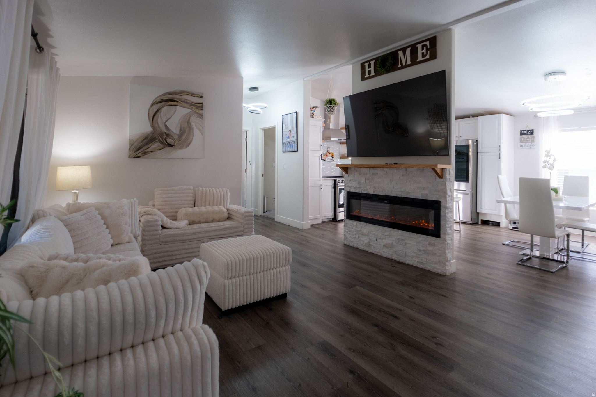 A true hidden gem! This beautifully updated 3-bedroom, 2-bath manufactured home is full of charm and thoughtful upgrades. The spacious primary suite offers abundant natural light and features a spa-like ensuite bathroom with a luxurious soaking tub, separate shower, double vanity, and elegant finishes. The inviting living room showcases a beautiful electric fireplace, creating the perfect space to relax and entertain. The stylish kitchen features granite countertops and comes complete with the range, microwave, washer, and dryer. Step outside to a beautifully maintained yard with a welcoming sitting area, pergola, and two storage sheds, plus security cameras for added peace of mind. A 2024 water heater adds extra value. Come see this exceptional home for yourself-you won't be disappointed!