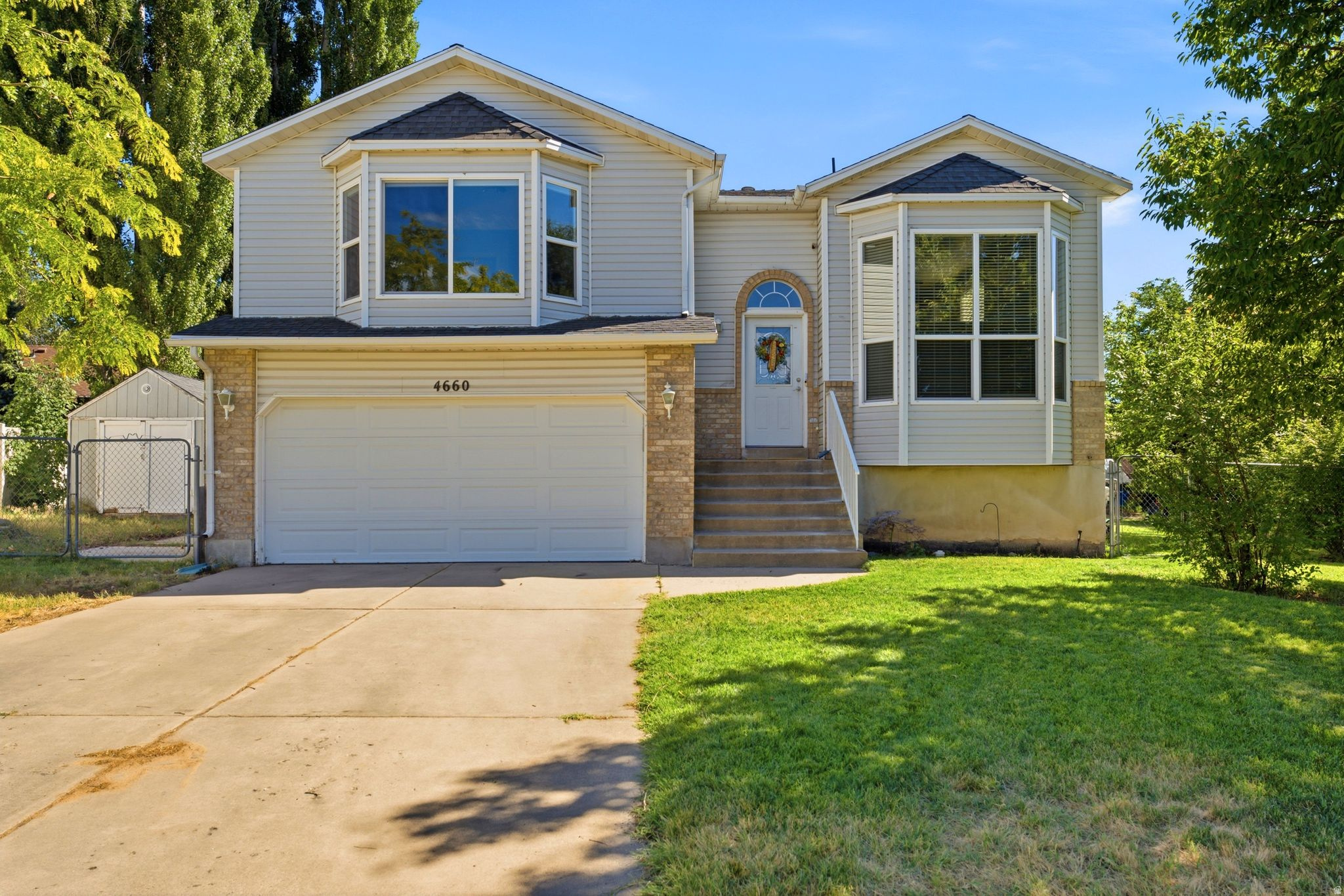 Enjoy beautiful Ben Lomond Peak views from this inviting home tucked away in a quiet cul-de-sac just west of Harrison Boulevard. The convenient location places you only minutes from McKay-Dee Hospital, Weber State University, shopping, dining, and recreation. Inside, you'll find a bright and functional open floor plan enhanced by new carpet and updated LVP flooring. The spacious primary suite offers a walk-in closet and private bath, creating a comfortable retreat at the end of the day. The walk-out basement expands the living space with a large family room featuring a cozy gas fireplace and plumbing for a future wet bar or possible 2nd kitchen.  A versatile bonus room provides the perfect space for a home office, playroom, fitness room, or additional bedroom. With flexible living areas, recent updates, and a desirable location, this home is ready to enjoy.  Square feet per county records buyer to verify all.
