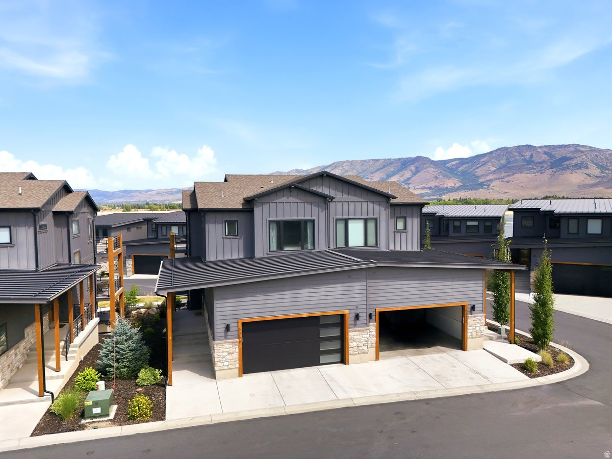 Experience luxury mountain living with exceptional investment potential in the heart of Huntsville. This stunning turnkey, fully furnished 4-bedroom, 4-bath home is approved for nightly rentals and is ready to generate income from day one. Comfortably sleeping up to 11 guests, it offers the perfect combination of personal retreat and high-performing vacation rental.  Thoughtfully designed with high-end finishes throughout, the home features an open-concept floor plan, a beautifully appointed gourmet kitchen, spacious gathering areas, and private bedroom suites that provide comfort and style for every guest. Expansive windows showcase breathtaking views of Pineview Reservoir and the surrounding Wasatch Mountains, creating a spectacular backdrop in every season.  Ideally located just minutes from Pineview Reservoir, Snowbasin Resort, Powder Mountain, and miles of hiking, biking, boating, skiing, and world-class recreation, this property places the very best of Ogden Valley at your doorstep. Sold fully furnished with quality furnishings and dcor, this is a rare opportunity to own a truly turnkey luxury mountain retreat with outstanding nightly rental income potential. Whether you're seeking a vacation home, an investment property, or both, this exceptional home is ready to enjoy from the moment you arrive. Buyer to verify all information, including nightly rental regulations and projected rental income.