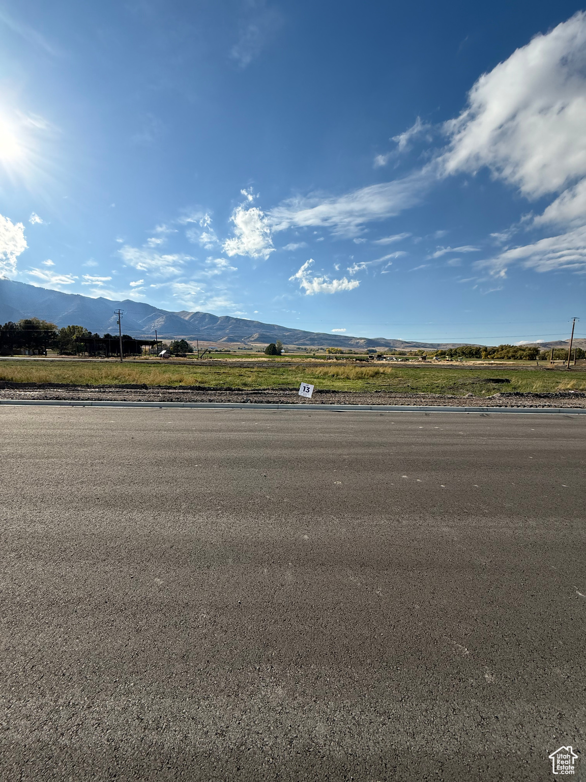 Bring your own Builder! Multiple lots available - Build your dream home in the peaceful and scenic community of Mendon. Blueberry Springs offers spacious 5/8+acre lots with breathtaking views of the mountains and valley. Enjoy paved public roads and full utility access, including Mendon City water, data, power, and secondary water stubbed to each lot. Irrigation water is managed and maintained by the Blueberry Springs HOA. Buyers are responsible for choosing and installing a septic system, subject to approval by Cache County. Each lot includes curb, gutter, and sidewalk frontage. This subdivision allows animal rights in accordance with Mendon City ordinances (https://mendoncityutah.gov). Bring your own builder and design your ideal home while adhering to city setbacks and protective covenants that maintain the neighborhood's appeal.