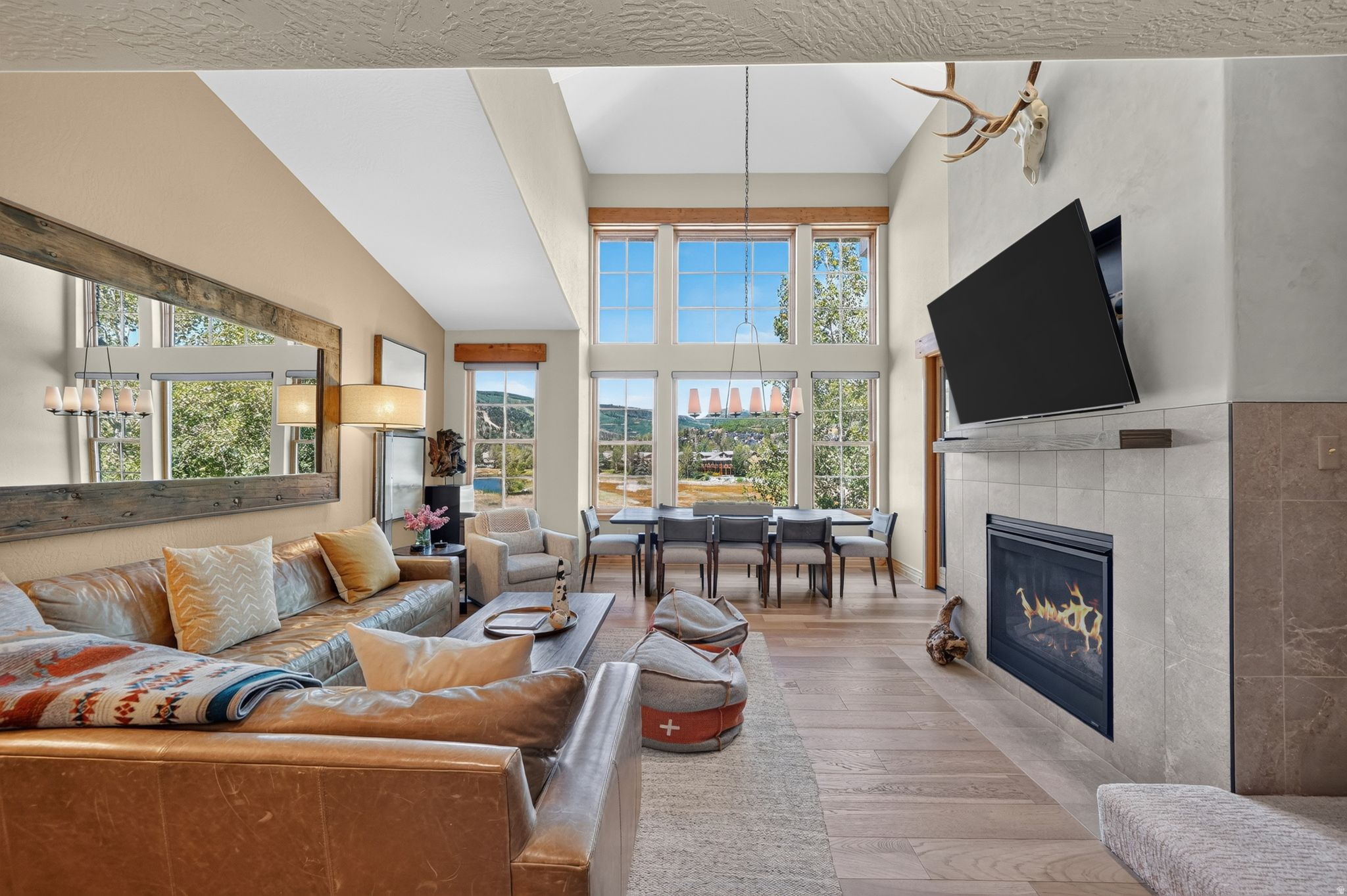 Experience the best of Deer Valley living in this beautifully appointed top-floor 3-bedroom, 3-bathroom condominium featuring a versatile 1-bedroom, 1-bath lockout unit-ideal for rental flexibility, guests, or primary residence.  Enjoy sweeping views of the lake and surrounding mountains from this exceptional residence, perfectly situated within walking distance of Deer Valley Resort.  Turn key condo, designed for both comfort and convenience, the property includes a private owner's closet for secure storage, dedicated secured parking, and shuttle service to Historic Old Town, providing effortless access to world-class skiing, dining, shopping, and year-round recreation. Whether you're seeking a full-time mountain residence, vacation retreat, or investment opportunity, this condo offers an outstanding combination of location, flexibility, and breathtaking scenery.