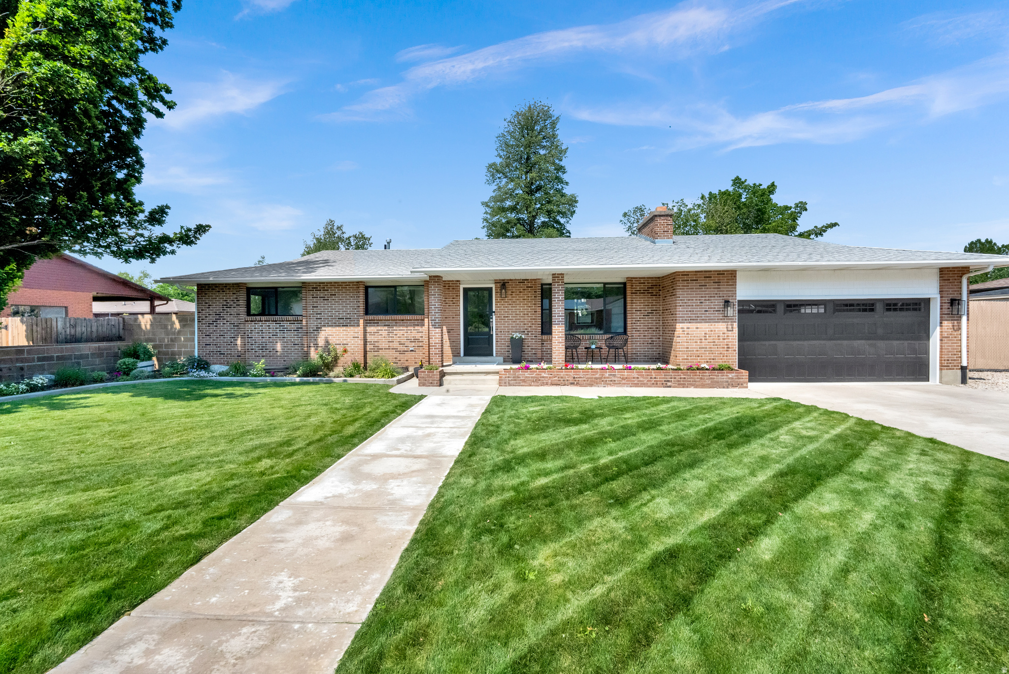 Rarely does a home like this become available. Located in one of the area's most sought-after neighborhoods with incredible views of Lone Peak--this beautifully remodeled home offers the perfect combination of timeless style, modern updates, and an unbeatable location. Enjoy being just minutes from a top-rated elementary school, incredible parks, shopping, dining, convenient freeway access, and some of Utah's finest ski resorts. This is not a flip. This home has been lovingly owned, meticulously maintained, and thoughtfully renovated by my family who truly cherished living here. Every improvement was made with quality, comfort, and long-term enjoyment in mind, creating a home that reflects genuine pride of ownership throughout. The extensive remodel includes a stunning new kitchen, beautifully updated bathrooms, new furnace and air conditioner, new upstairs windows, new interior doors and hardware, new lighting, new flooring, new cellular shades, a new front door, insulated garage door with opener, epoxy garage floors, updated landscaping, new sprinkler systems, huge storage room , huge laundry room, tons of storage, and much more. One of the property's standout features is the massive RV parking area, measuring approximately 104 feet long by 20 feet wide-providing rare space for RVs, trailers, boats, recreational vehicles, and additional parking. Outside, you'll find beautiful curb appeal, refreshed landscaping with new concrete borders, a new Tuff Shed, and outdoor spaces designed for both beauty and functionality. Homes in this neighborhood are rarely available, and homes with this level of care, updating, and RV parking are even harder to find. This is a truly special opportunity to own a home that has been deeply loved and exceptionally maintained. Square footage figures are provided as a courtesy estimate only and were obtained from county records.  Buyer is advised to obtain an independent measurement. Owner/Agent