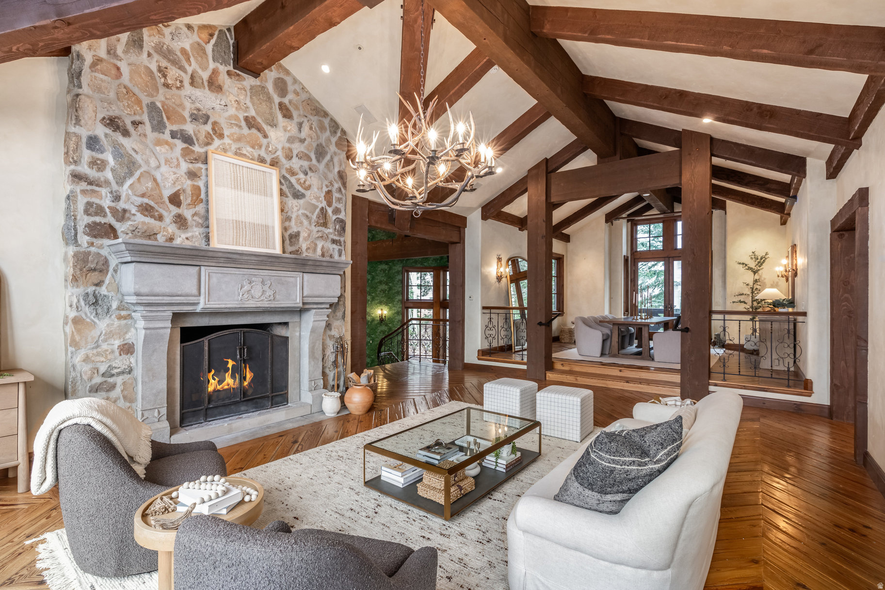 Property was featured in the Wall Street Journal on Valentine's Day 2026. Staffed gatehouse monitors access to the prestigious Bald Eagle neighborhood of only 58 homes. Private location in a sunny grove of aspen trees is one home removed from Deer Valley's Roamer Ski Trail providing additional privacy and tranquil setting away from the noise of snowmaking and grooming as well as the gaze of passing skiers. Walk to private park with play equipment, grassy lawn, and picnic tables. Virtually in the center of Deer Valley Resort and surrounded by ski, hiking, and biking trails, but only five minutes to restaurants and shops in Silver Lake Village; 10 minutes on local streets to Park City's Historic Main Street, and 45 minutes to Salt Lake International Airport. Guests enjoy the ultimate tranquility of seven private suites, grand spaces for elegant entertaining, and cozy nooks for reading a book or sipping tea by a crackling fire. 11 fireplaces, romantic balconies and captivating windows framing long mountain views set the stage for multi-generational gathering. Self-contained apartment is ideal for au pair, cook or caretaker. A circular front drive creates an inviting arrival experience and offers ample parking, while an oversize 3-car garage, level heated drive, and elevator make the owner experience seamless. Competitive pricing allows new owner to invest to their taste and style with confidence.