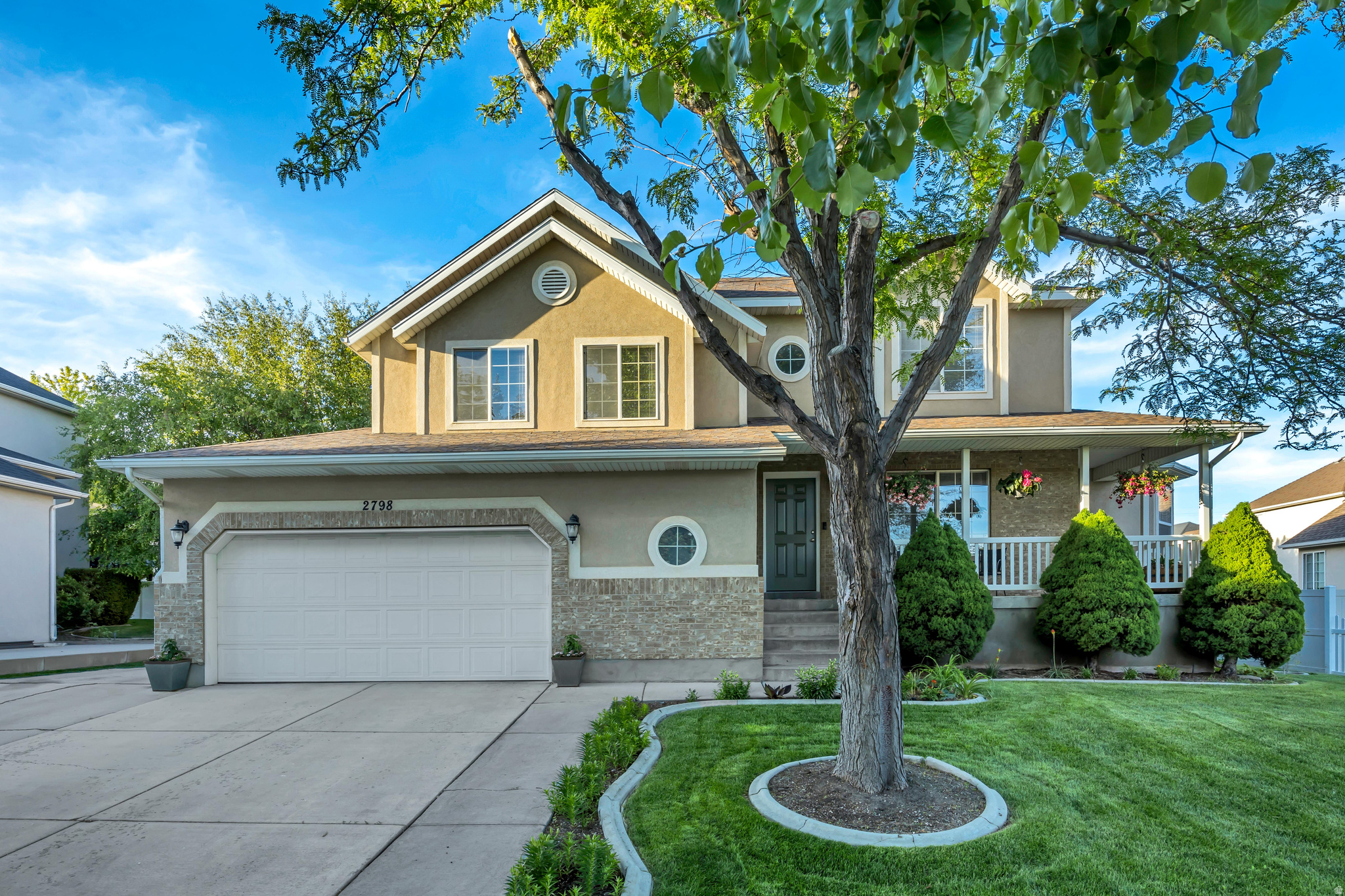 Wonderful home in the amazing Ivory Highland community! Relax on the inviting front porch while taking in mountain views, sunrises, rainstorms, and evening skies. Property offers a little homestead charm! A gardener's dream in the backyard includes grape vines, elephant heart plum tree, raspberries, blueberry bush, strawberries, a large established garden space, and chicken coop. Major improvements include roof replacement in 2021, furnace replacement in 2020, new water heater in 2025, brand new kitchen appliances, and brand new carpet. With a one-of-a-kind retro-inspired basement diner complete with a fun 50s vibe and wet bar area. Perfect for movie nights, game nights, or entertaining guests. **Seller is licensed Utah Real Estate Broker**