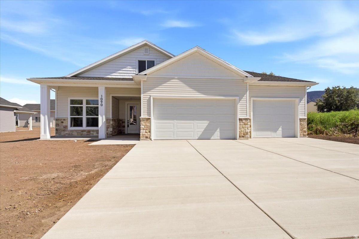 Amazing custom home with SINGLE LEVEL LIVING. Best of both worlds with a patio home main floor and large living area upstairs. Owners bedroom / bathroom suite, kitchen, family room and laundry are all on the main floor with a 2nd story with 2 bedrooms, family room and bathroom. This home features custom touches throughout, from the custom cabinets, quartz countertops, gas fireplace, walk-in pantry, large walk-in closets, high-end finish work, 3-tone paint, custom lighting, and so much more! All this on a nice South facing lot!  Home is under construction with a completion estimate of late June to mid July.