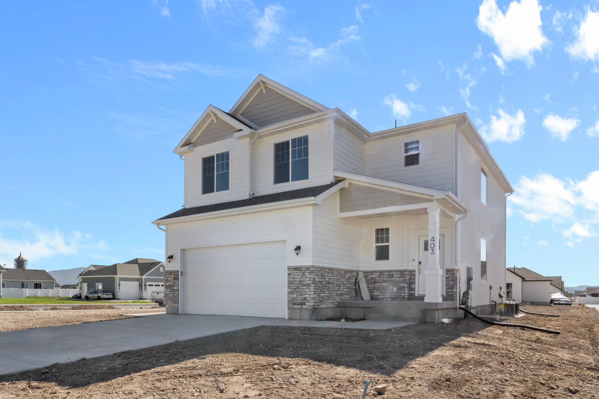 This brand-new home will be move-in ready by mid June! With 3 bedrooms, 2.5 baths, and a versatile loft, this thoughtfully designed floor plan offers the space and flexibility today's buyers are looking for. The main floor features a bright, open layout that flows seamlessly between the kitchen, dining, and living areas-perfect for everyday living and entertaining. Upstairs, you'll find a spacious primary suite with a walk-in closet and private bath, along with two additional bedrooms and a flexible loft space ideal for a home office, playroom, or second living room. Located in a growing Logan community close to schools, parks, and everyday conveniences.