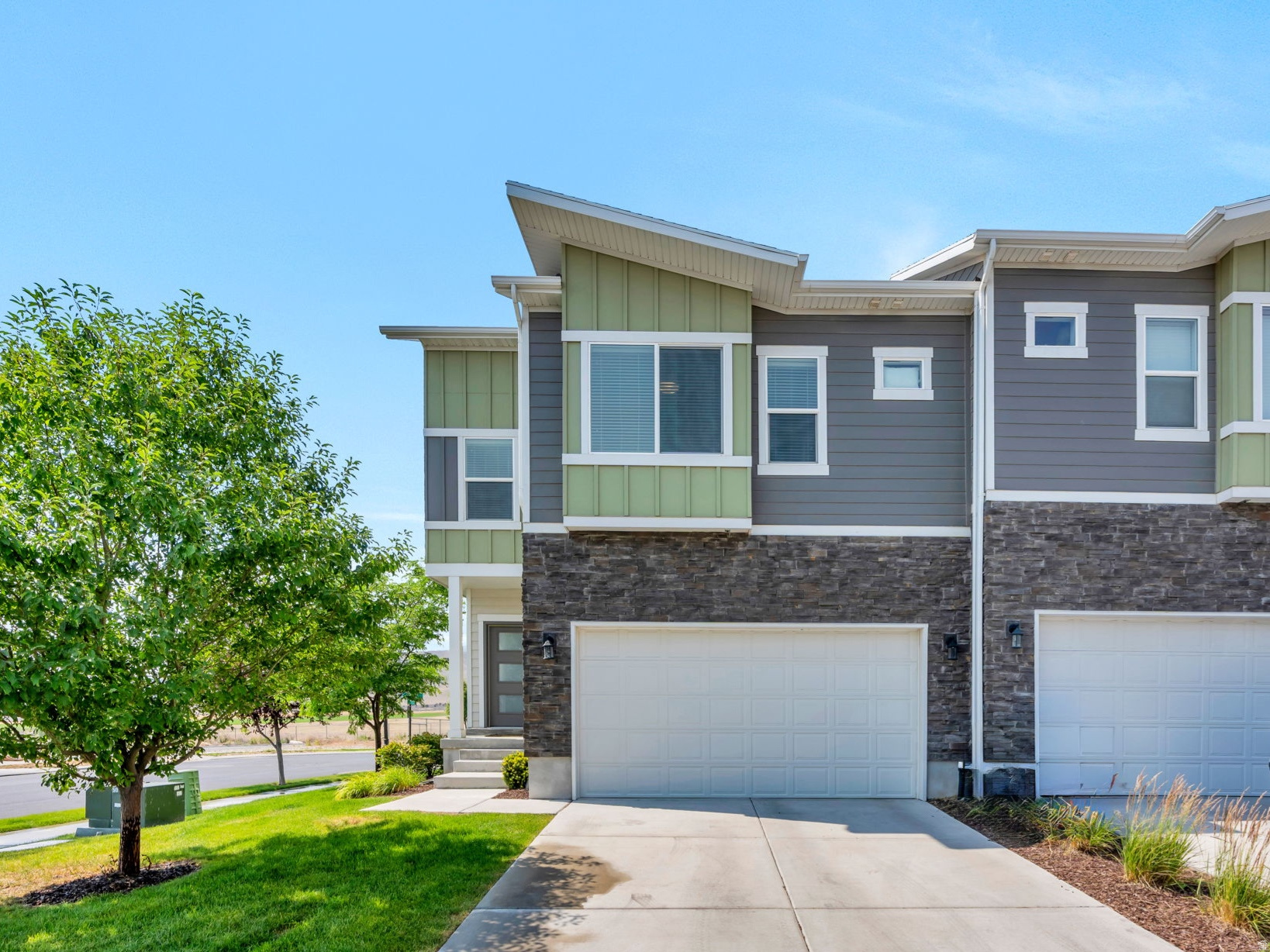 OPEN HOUSE SAT JUNE 27th, 10AM to 12PM.  Showings will begin at the Open House! Welcome to the neighborhood where families enjoy evening strolls, little tikes on bikes frequent the sidewalks, friends gather at the park, and kids can often be found playing outside until the sun goes down! This darling END UNIT, 4-bedroom townhome is tucked into a warm, family-friendly community near an elementary school, making morning drop-offs and afternoon adventures a breeze.  Inside, you'll find stylish upgraded finishes, a bright and inviting floor plan, 1 full bath, 3/4 bath, and a convenient 1/2 bath. The mostly finished basement provides extra space for movie nights, a playroom, homework headquarters, or a cozy family retreat.  Garage includes Electric Charging for your stylish vehicle needs. Step outside and enjoy a neighborhood known for its strong sense of community, where children make lifelong friends and neighbors become like family. Whether it's riding scooters, playing at nearby parks, or gathering for community events, this is the kind of place where great memories are made.  Move-in ready and full of charm, this home offers the perfect combination of comfort, convenience, and community. Come see why so many families love calling this neighborhood home!  Buyer/Broker to verify all.