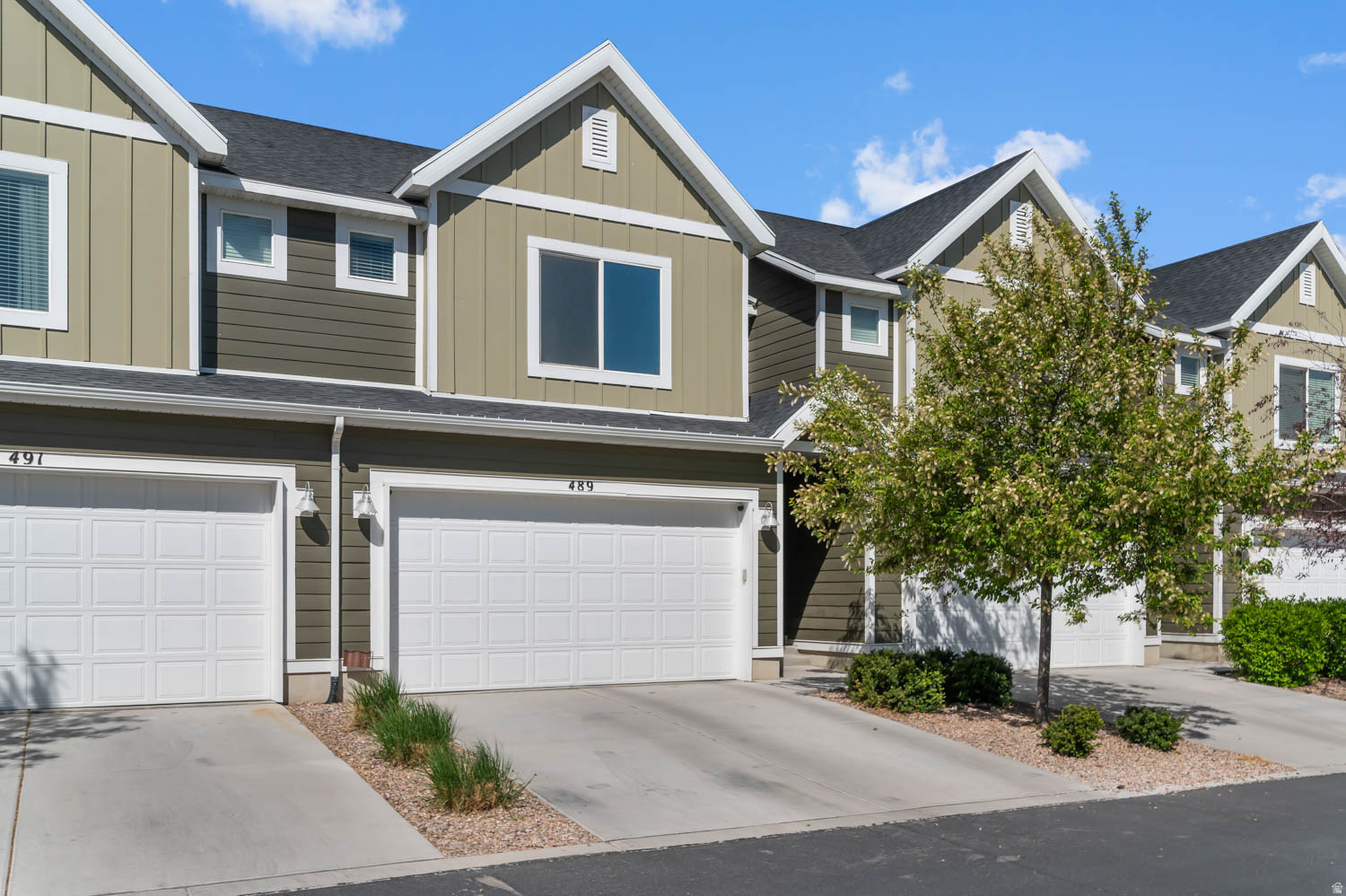 Two-story townhome with a finished basement. Two car garage with built-in overhead storage, ground level storage shelves and a quiet belt garage door opener. Quartz countertops and soft close cabinets in the kitchen and upstairs bathrooms.  Back porch area is fully fenced. Basement has a bathroom with a standup shower, a built-in playhouse/loft and is completely wired for a theater. There's a cold storage room in the basement as well as under stair storage in the utility room. The home has central air-conditioning and central gas heating. There are three full bedrooms upstairs. The Master has two walk-in closets and an attached bathroom. The second bedroom also has a walk-in closet. Ceiling fans in each bedroom and a screen/glass storm door on the main entry. The house has a soft water system installed as well as a reverse osmosis system. The windows have tint installed which assists in the summer with keeping the house cooler. This house is well within walking distance of the nearby elementary school and is very close to the neighborhood pool, splash pad and clubhouse.