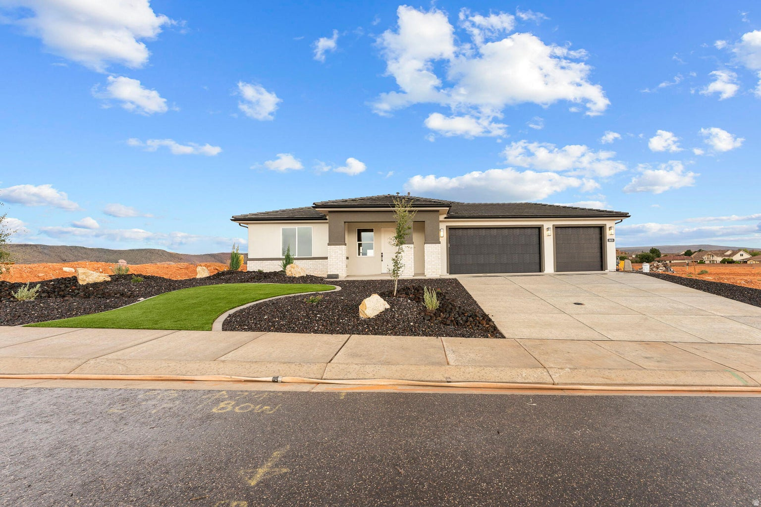 This beautifully newly built finished 3-bedroom, 2.5-bathroom home in the scenic Sand Hollow area offers the perfect opportunity to own a thoughtfully designed residence by Holmes Homes. With modern finishes, open-concept living, and a 3-car garage, this home is ideal for full-time living, a second home, or a low-maintenance desert retreat. Located in the Dixie Heights community near Sand Hollow Reservoir, sand dunes, and award-winning golf. Enjoy the best of Southern Utah's outdoor lifestyle, built just for you.