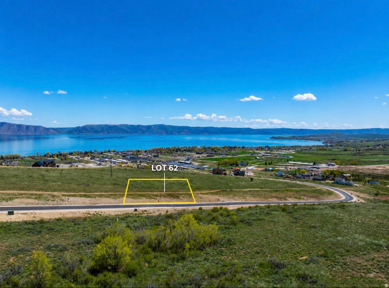 Build your dream getaway near Bear Lake-known as the Caribbean of the Rockies. This 0.95-acre lot offers space, privacy, and beautiful mountain and valley views. With nearly a full acre, there's room to build a cabin, full-time home, or investment property. Enjoy easy access to boating, beaches, ATV trails, and year-round recreation. Utilities are nearby (buyer to verify). The first 30 lots include the water connection impact fee (a $6,000 value in 2026). A great opportunity to own in one of Bear Lake's most sought-after areas.