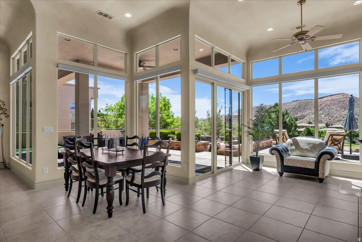 Perched above the 7th green and 8th tee box on Sunbrook Golf Course, this exceptional home captures sweeping, unobstructed views that are truly unforgettable. Designed to impress, the interior showcases soaring 12-foot ceilings, automated shades, wood shutters, and a dedicated built-in office. The gourmet kitchen is outfitted with a Wolf gas cooktop, Sub-Zero refrigerator, Thermador ovens, and beautiful granite countertops. The outdoor entertaining space has been recently refreshed with new landscaping, a cozy fireplace seating area, gas BBQ, and a private dog run with artificial turf. Rarely does a view property like this become available--an incredible opportunity in a premier golf course setting
