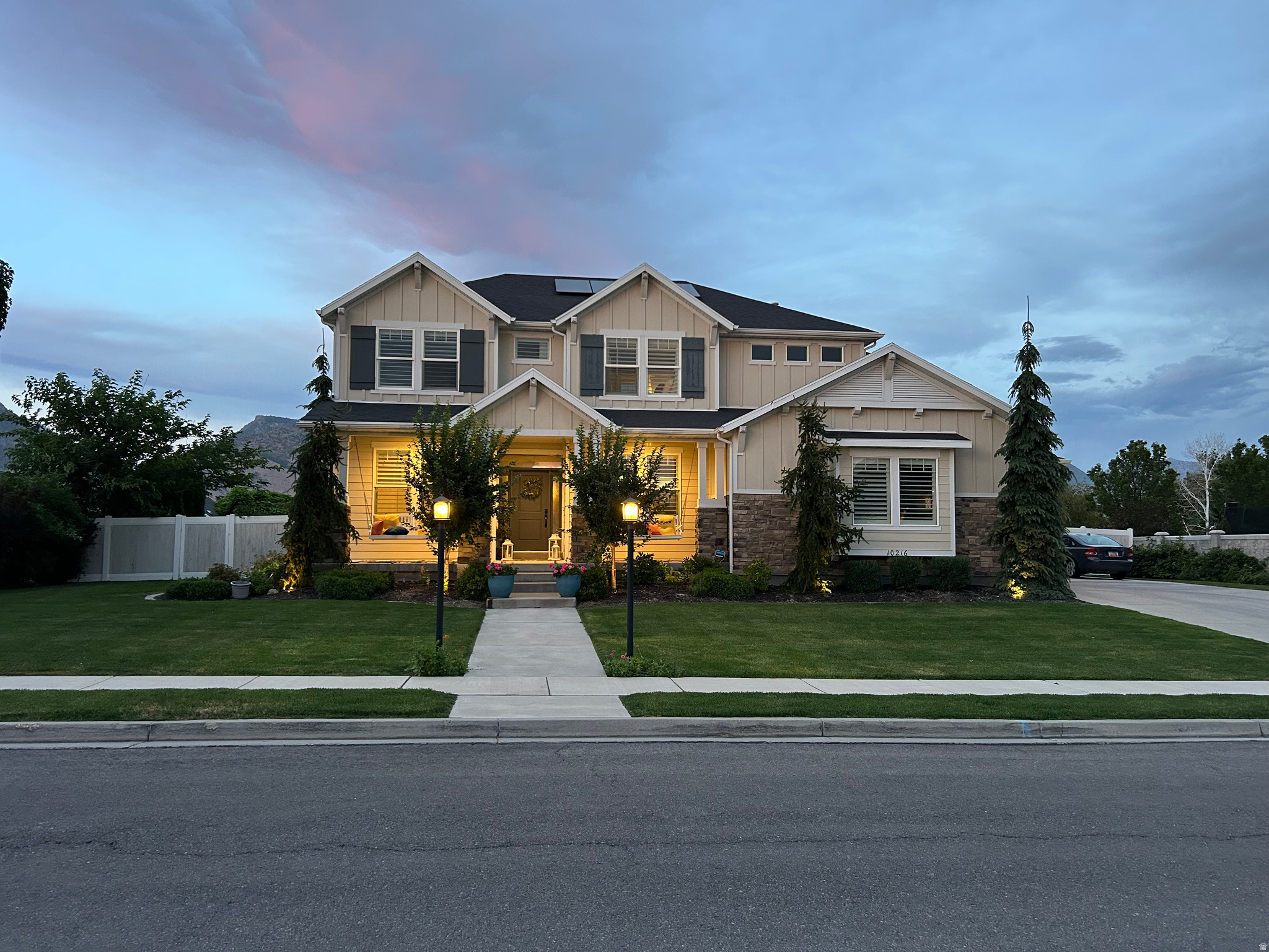 Beautiful home in Highland, close to shopping, parks, schools, and miles of walking trails.  The front of the home faces West, perfect for afternoon shade in the back yard/entertaining area.  Large windows with unobstructed views of the Timpanogos & Lone Peak.  Private back yard with mature trees and bushes, large gazebo, fire pit, trampoline, & garden boxes.  Mature blackberry and raspberry plants south of the garage.  The front walk is lined with two low voltage light poles and landscape lights.  The front porch has two porch swings on both sides of the front entry, to sit and enjoy the evening sunsets.    The home has an open family, dining, & kitchen area with a formal dining room/office separated by a 1/2 bath and butler's pantry & front living room.  Large mudroom with 5 private lockers connected to a large laundry room with soaking sink.    Upstairs opens to a media room (Fits a 98" TV) with large windows with extra views of to the north and west mountains.  Straight hallway to the spacious primary bedroom suite with sitting area.  Bathroom has double vanity with a separate makeup desk, large walk-in tile shower/steamer, walk-in closet organized with drawers, shelves, pant hangers, and hanging rods.  3 additional bedrooms with a large bathroom with double vanity and separate tub and toilet room.    From the mudroom exit to a large painted and floor finished 3-car garage, 2-car side loaded garage and 3rd car front garage great for boat, toys, or additional car along with a RV pad.
