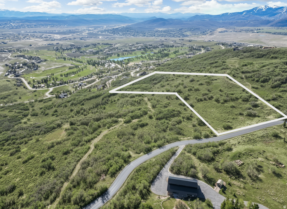 Discover a rare opportunity to build your dream mountain retreat on this exceptional 10.91-acre homesite within an exclusive gated community. Offering an unparalleled combination of privacy, serenity, and natural beauty, this expansive lot provides the ideal setting for a custom residence surrounded by breathtaking landscapes and abundant wildlife. This secluded location is unmatched due to its proximity to Park City's world-class amenities, including premier skiing, hiking and biking trails, championship golf, fine dining, boutique shopping, and year-round recreation. The Ranches At The Preserve community is just 30 minutes from Salt Lake International Airport and in the highly sought after Park City school district.  Enjoy the perfect balance of peaceful mountain living and convenient access to the vibrant Park City lifestyle. Large acreage parcels in gated communities are increasingly rare, making this a unique opportunity to create a legacy property in one of Utah's most sought-after destinations. The building envelope (at your choosing) allows up to 4 structures including  a primary residence, guest house, caretaker house or barn.  Whether you're seeking a private family retreat or a luxury mountain estate, this remarkable homesite offers endless possibilities