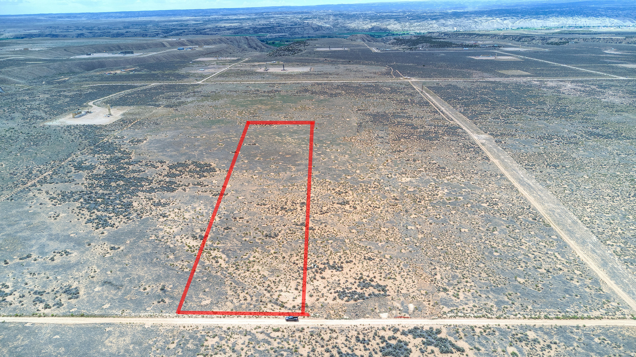 Flat, buildable land ready for your vision. Located just off W 5500 S with utilities within a mile, this 10-acre A5-zoned parcel offers the perfect balance of residential comfort and agricultural flexibility -- no HOA, no restrictions slowing you down. Available individually or paired with the adjoining 10-acre lot to the west, giving you the option to expand your footprint and make it something truly your own.