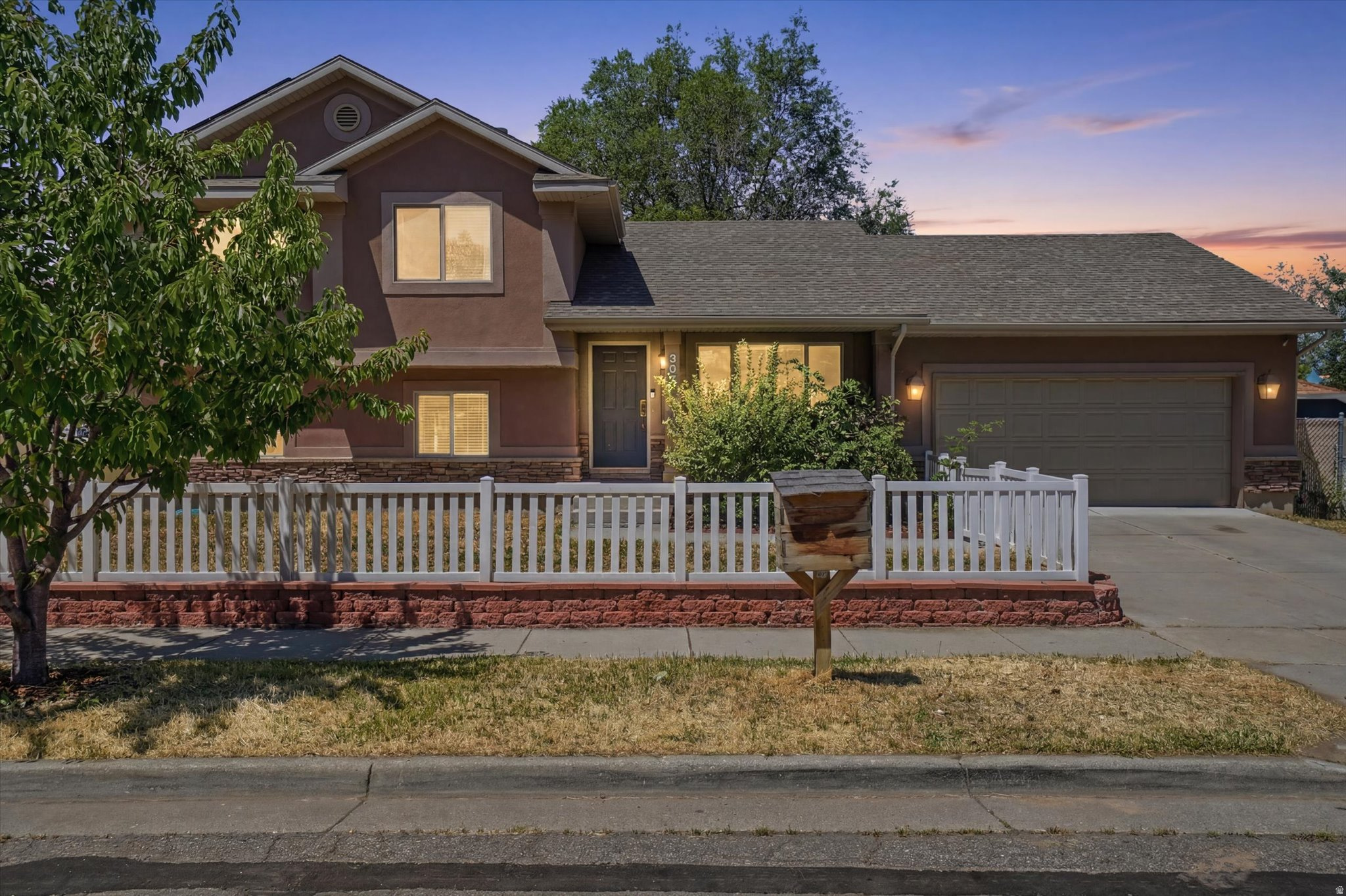 Welcome home to this spacious 5 bedroom, 3 bathroom split level slice of paradise in one of Salt Lake City's most vibrant and welcoming communities. With nearly 2,250 square feet of thoughtfully designed living space, this home offers a functional layout that's perfect for hosting friends and family. The kitchen features granite countertops and new appliances. Wool carpeting on the main floor offers a clean and durable upgrade, a new energy-efficient HVAC system, furnace, and water heater from Amana and paid-off solar panels are a recipe for low utility costs. Outside, enjoy a fully fenced yard with mature fruit-bearing cherry and apple trees, along with a prolific blackberry bush that provides bountiful and delicious seasonal harvests. Pair those with the backyard sand pit and the framework for a garden in the side yard and you're halfway to a mini homestead right downtown! The attached extra-deep two-car garage houses an additional fridge/freezer, abundant space for vehicles, outdoor gear, and so much more! The large basement bedroom offers exceptional flexibility and could easily serve as a home office, homeschool space or play room. Situated on a corner lot this home provides convenience and community connection. You'll be minutes from excellent local restaurants like Koyote and Red Iguana, and popular stops for the TRAX and Frontrunner. Convenient access to I-15 and just the right distance from the airport. The Jordan River Trail, the Northwest Community Center, and Marmalade Library are only a short bike ride away. And don't forget about your morning walk to Culture Coffee! THIS is the place! Sellers will include a family blackberry cobbler and cherry pie recipe too!