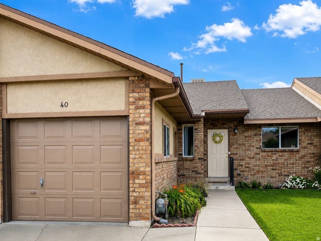 **OPEN HOUSE** Saturday 7/18 from 10am-11am. NOT YOUR AVERAGE CONDO! This cozy ranch rambler is sure to surprise you! Enjoy main level living with three bedrooms, two bathrooms, and over 2,200 square feet. Incredible lake and mountain views from your private, fenced backyard while relaxing on your covered patio. Sneak a peek from your living room, and even your primary bedroom! This all brick condo has recently been refreshed and is ready for you! All appliances included. (2 Washer/Dryer sets & refrigerator). Freshly painted garage door. Home is in a trust with limited seller disclosures and is being sold AS-IS. Please allow 48 hours for all response times. All information deemed reliable but not guaranteed. Buyer to verify all.