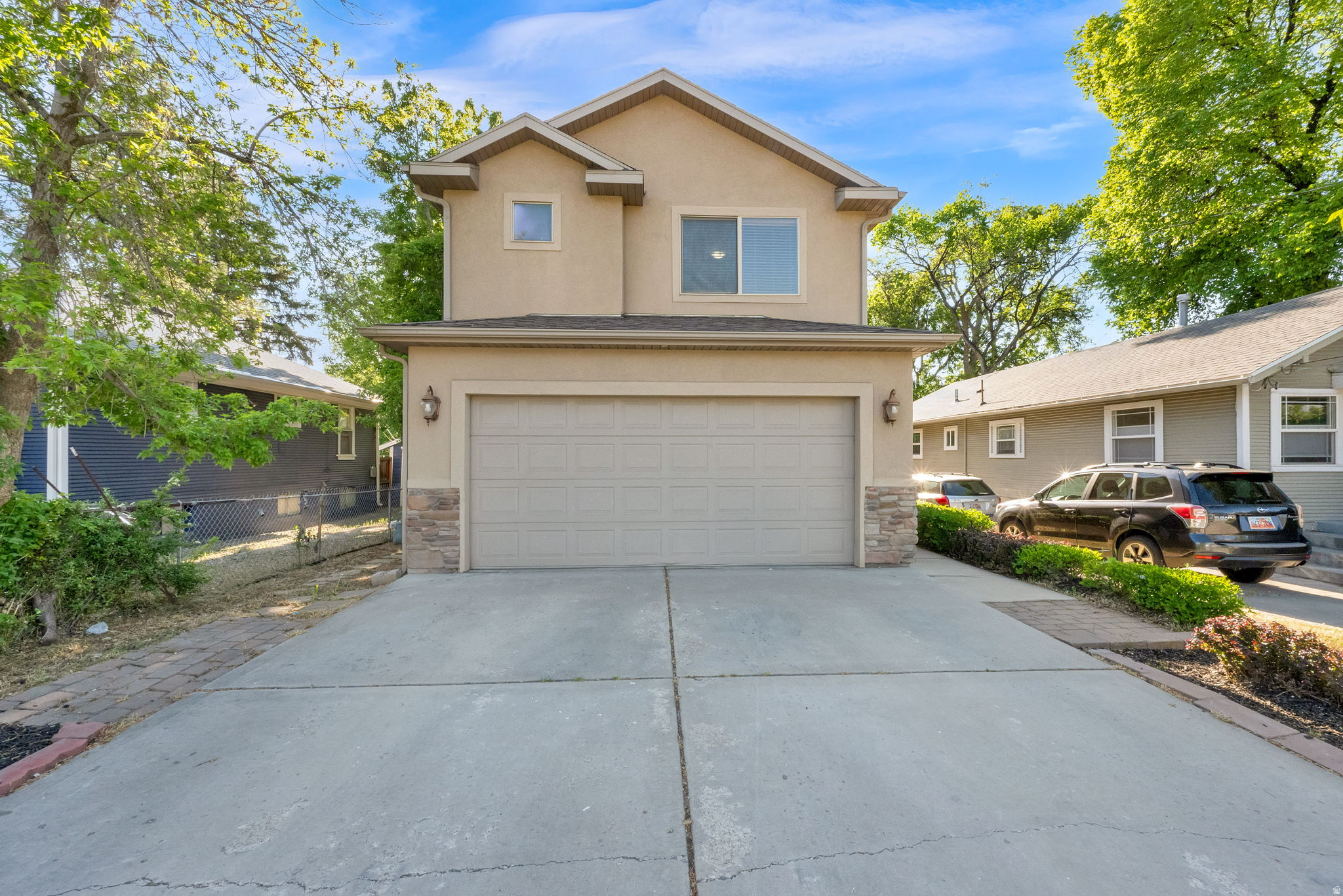 MULTIPLE OFFERS RECEIVED! ALL OFFERS DUE BEFORE 4pm on May 18th. Beautiful 4 bed, 2.5 bath home in an unbeatable location just across from Nibley Park Golf Course! Enjoy quick access to parks, shopping, dining, and freeway connections while tucked into an established neighborhood setting. Inside, the bright open-concept layout is filled with natural light and designed for comfortable everyday living and entertaining. The spacious kitchen features stylish cabinetry, expansive countertops, bar seating, and seamless flow into the main living and dining areas.  Upstairs, the private primary suite offers a spa-inspired bath complete with a stunning oversized glass shower, separate soaking tub, and modern finishes throughout. Step outside to enjoy the balcony overlooking the fully fenced backyard - perfect for relaxing, entertaining, or enjoying the mature surroundings. With thoughtful updates, inviting spaces, and an ideal central location, this home combines convenience, comfort, and style all in one package.