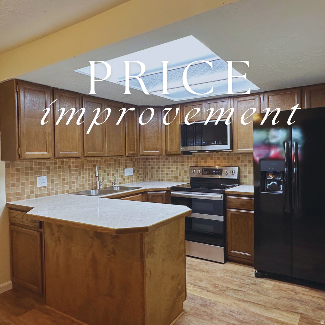 **OPEN HOUSE SATURDAY JUNE 11TH 9:30am-11:30am** Welcome to easy, low-maintenance living in this desirable ground-level end-unit condo in the heart of Roy! Featuring fresh paint, updated flooring, and an abundance of natural light, this move-in-ready home offers both comfort and convenience. The upgraded washer, dryer, refrigerator, and double oven are all included, making your transition seamless.  Inside, you'll find a functional floor plan with a spacious living room, dedicated dining area, and a private primary suite complete with its own bathroom. Stay cool during the summer months with the ground-level location, and cozy up by the charming brick fireplace during the winter.  Step outside to enjoy mature landscaping, a peaceful community setting, and a nearby picnic area perfect for relaxing outdoors. The home also includes two covered carport parking spaces and a private lockable storage area for added convenience.  The HOA covers insurance, exterior maintenance, water, sewer, trash, and snow removal, allowing you to enjoy worry-free living year-round. Conveniently located near schools, shopping, dining, and major commuter routes, this home is perfect for first-time buyers, downsizers, or anyone looking for comfortable living with minimal upkeep.  Schedule your private showing today!