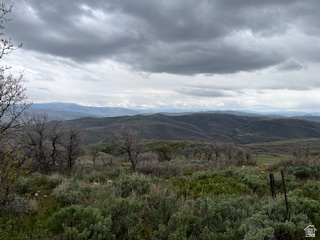 Enjoy private seclusion on this 6.43 acre ranch lot with fantastic mountain views.  Property is covered with aspen and pine trees with many options on where to build your family get away.  Property is approximately 200 yards from existing plow route.  Located only 35 minutes from Salt Lake and 20 minutes to Park City for shopping, dining, golf and world class skiing.