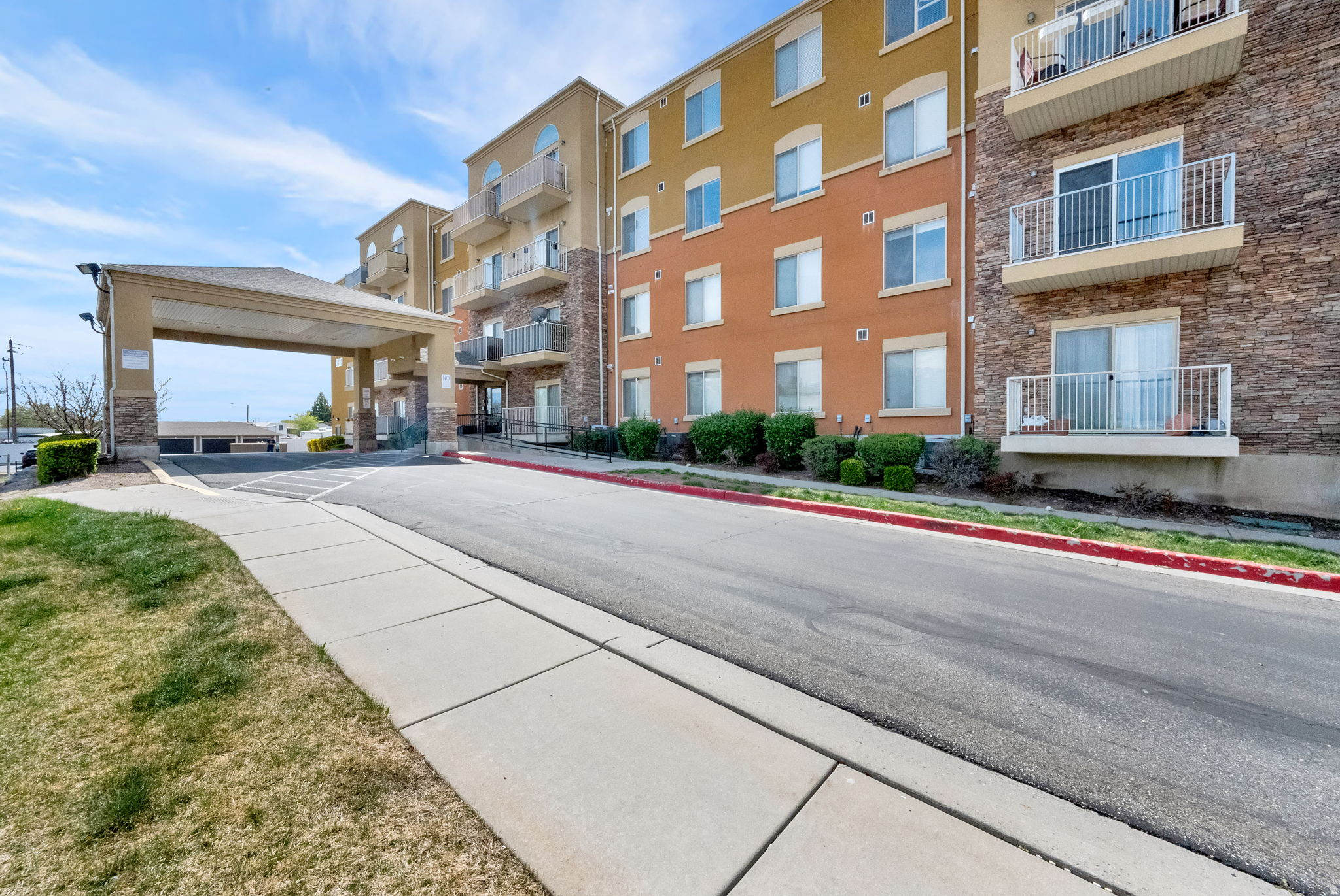 Welcome to this beautifully maintained and thoughtfully updated mid-level condo in the desirable Village at River's Edge community. This 2-bed 2-bath home features a spacious open floor plan, 9-foot ceilings and tons of natural light. In the kitchen you will find gorgeous granite countertops, stainless Steel appliances, and plenty of cabinet space. Large primary suite with walk-in coset and double vanity. New light fixtures throughout and a private balcony. This unit even comes with an extra storage room. Enjoy year-round ease and comfort with your own heated garage space. This secure, elevator-access building offers single-level living with wide hallway and no-step entry. Perfectly situated by freeway access, shopping and restaurants, this move-in ready condo offers convenient, low-maintenance living in the prime location!