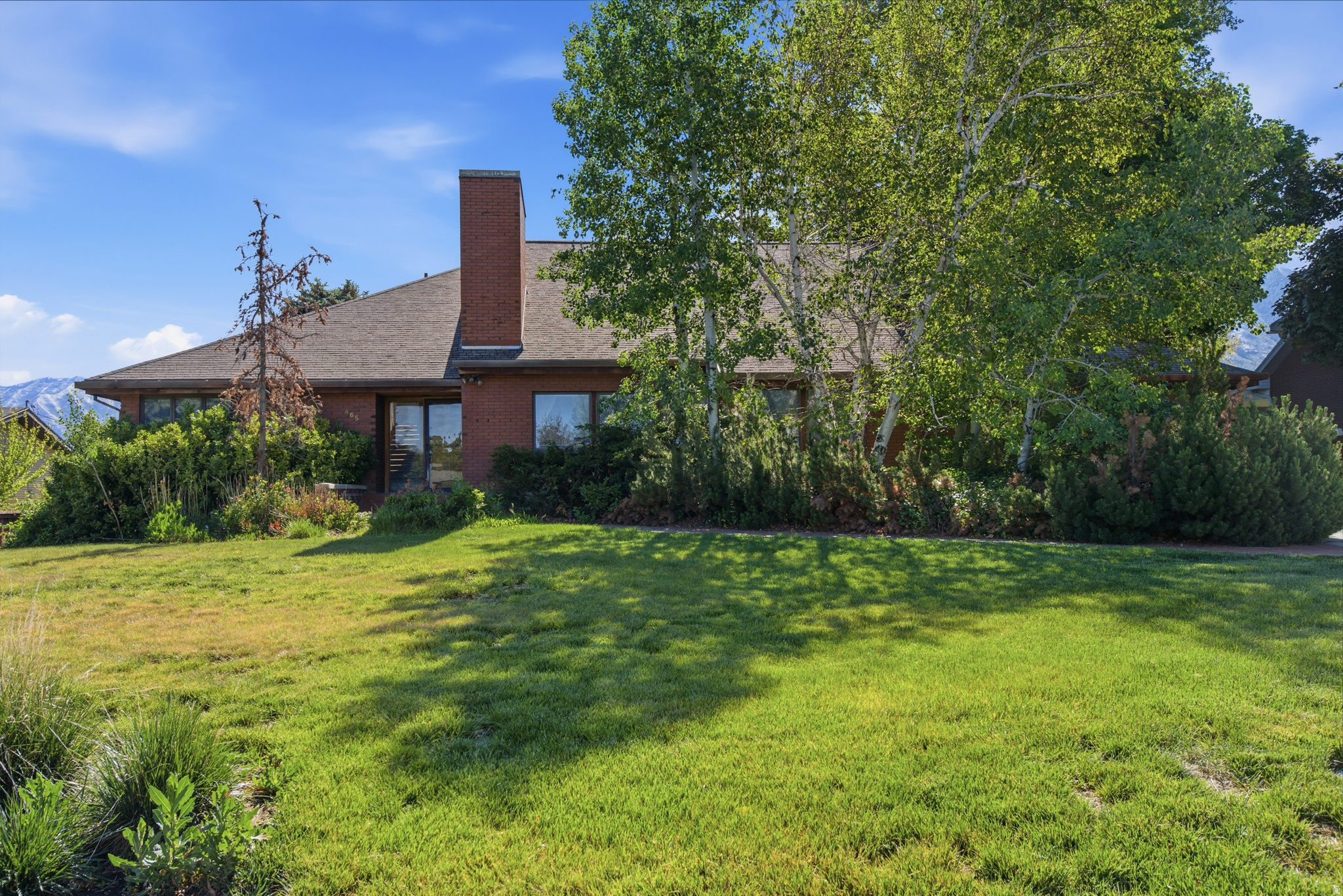 Discover this charming 6-bedroom, 3&1/2 bath home in a quiet, peaceful Salem neighborhood. With over 5,000 sq. ft. across three stories, this classic beauty offers space, character, and endless potential. There have been many updates done, including new carpet throughout the basement and fresh paint. The layout allows flexibility for large families, guests, or creative spaces. Outside, a secluded backyard invites you to relax or entertain on the large deck surrounded by mature trees, while soaking in the stunning mountain and pond views. This home combines privacy, natural beauty and charm, and is ready to become your dream home.