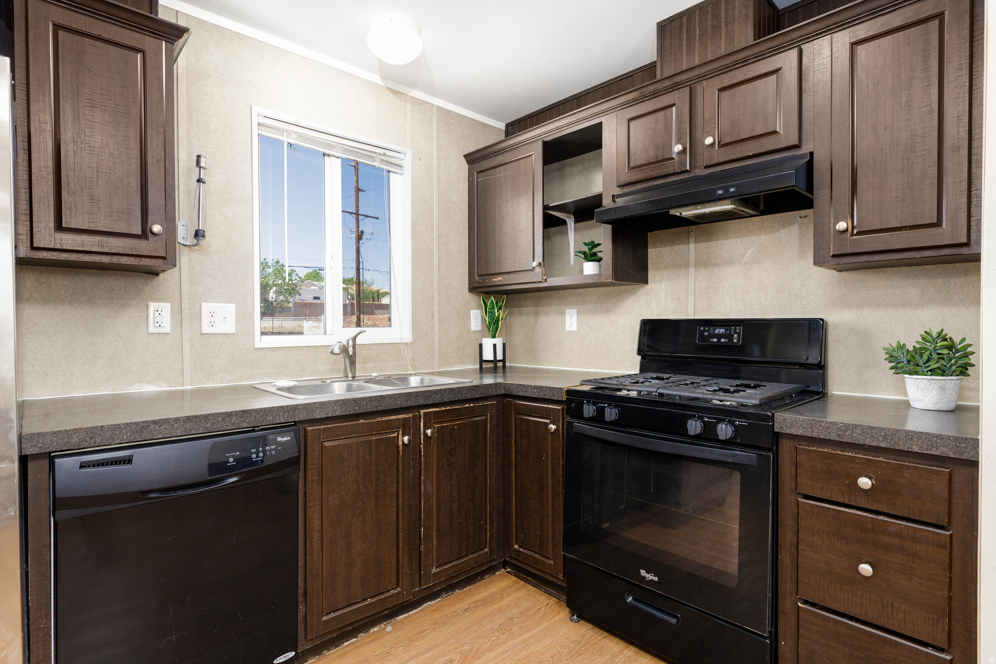 Looking for a consistent addition to your rental portfolio or a great location to live? This 2017-built manufactured home in Pecan Tree Park offers a practical, high-demand layout for the Hurricane rental market. Featuring 2 bedrooms and 2 full bathrooms, this unit maximizes functionality for tenants. The kitchen comes equipped with included appliances and a dedicated laundry area. Enjoy the convenience of two dedicated parking spaces and pet-friendly living (with landlord approval and registration). This property offers excellent rental potential in a desirable location. Cash purchase only. Buyer subject to park approval. Current lot rent is $700/month.