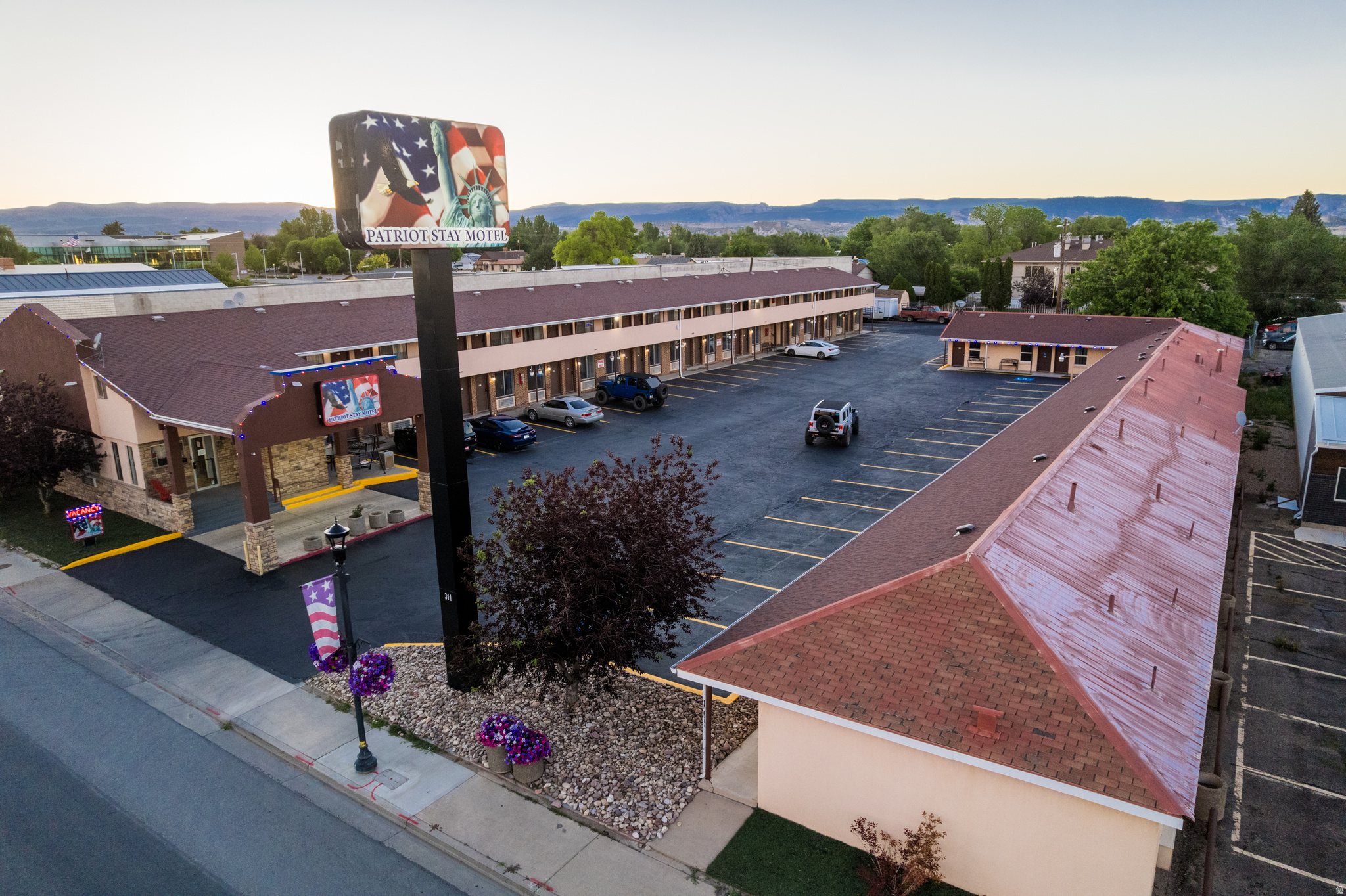 Position your portfolio for steady cash flow and long term growth with this renovated 50 room and manager apartment hospitality property located in the heart of Vernal. This turnkey investment opportunity sits on 1.06 acres with 64 parking spaces and continues to benefit from strong tourism, energy, outdoor recreation, and business travel traffic throughout the Uinta Basin. Originally built in 1982, the property underwent major upgrades and improvements following a 2024 rebrand, creating a modern and welcoming experience for guests while reducing future capital expense concerns for a new owner. This property presents an outstanding opportunity for investors seeking a hospitality asset with strong curb appeal, updated infrastructure, and immediate operational potential. Its location in one of eastern Utah's busiest tourism and recreation corridors places guests within reach of national parks, dinosaur attractions, oil and gas industries, hunting, fishing, and year round outdoor recreation. Property sold "As Is", with no seller warranties.