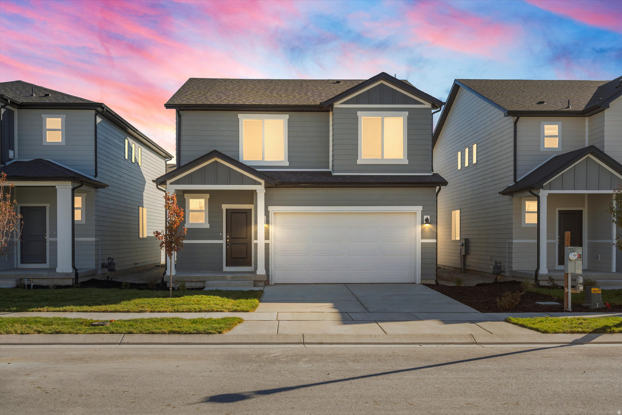 This home boasts open-concept living with a dining and great room connected to the kitchen. Upstairs, enjoy the loft as a multipurpose space and a laundry room. Unfinished basement included in home. Move in ready with a washer, dryer, fridge and blinds throughout! Total home approx. sq. ft. 2,585.