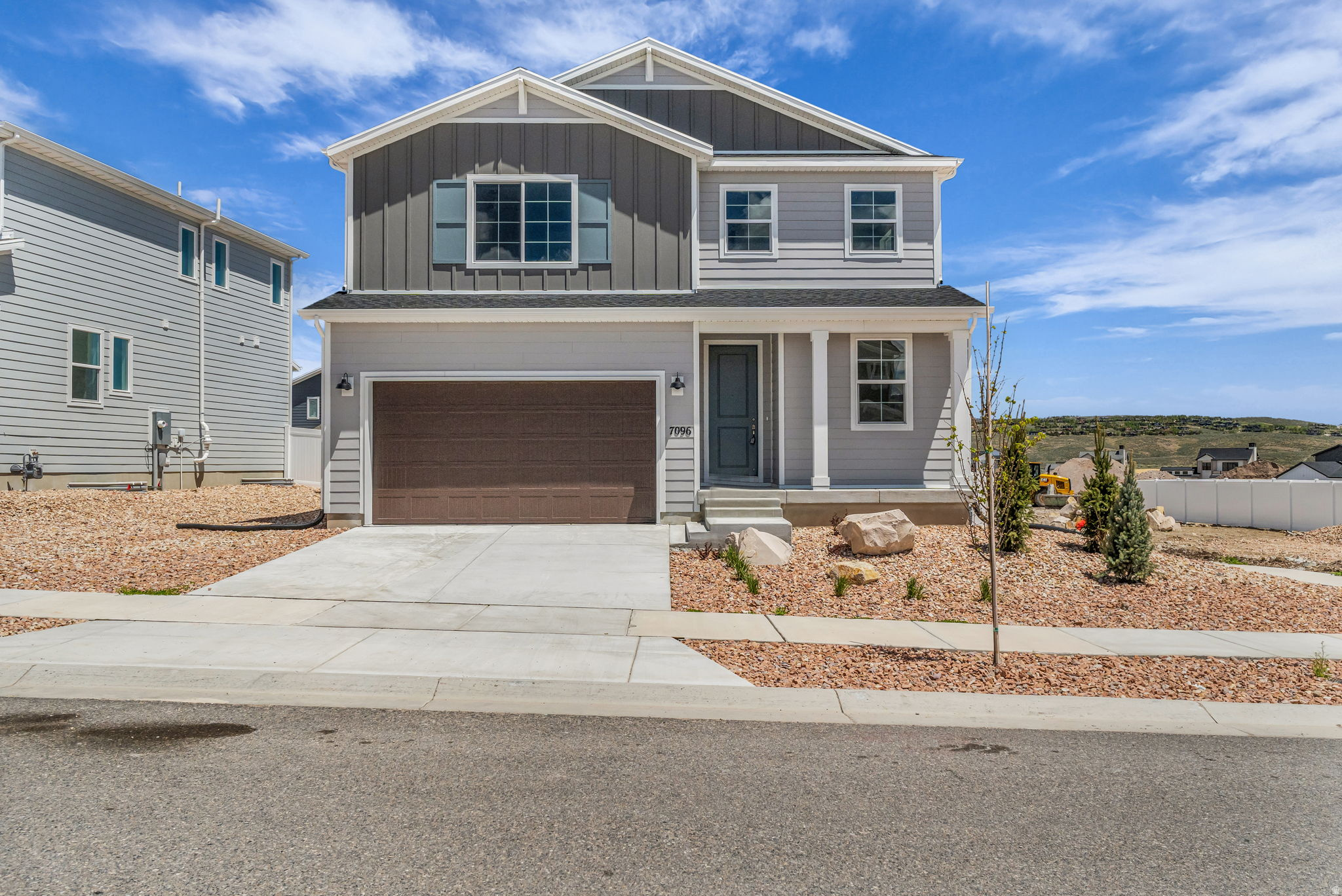 Move in ready, new construction home located in Silver Creek Village. Take a step inside to see the beautiful hardwood lvp flooring, a convenient laundry-mud room off the entryway, bright finishes and a cozy linear gas fireplace in the living room . The kitchen features shaker cabinets, stainless steel appliances, a double oven setup including a gas range with a hood, quartz countertops and a kitchen island with seating for three. You can enjoy your morning cup of coffee out back under the covered patio as you take in the mountain views from the privacy of your fully fenced yard. Home Energy Rated & NGBS Green Certified Home, designed with efficiency and sustainability in mind from the xeriscaped yard to the High efficiency HVAC system and Tankless hot water heater. The lower level of the home features a full sized bathroom, living room and one of the home's private bedrooms. The upstairs level features an open loft area great for a home office, gym or play area for kids as well as three bedrooms, including the primary bedroom suite. The home is conveniently located near hiking and biking trails, shopping centers, restaurants, parks, and other amenities, making it an ideal place to call home for both full-time residents and vacationers alike, schedule your showing today.