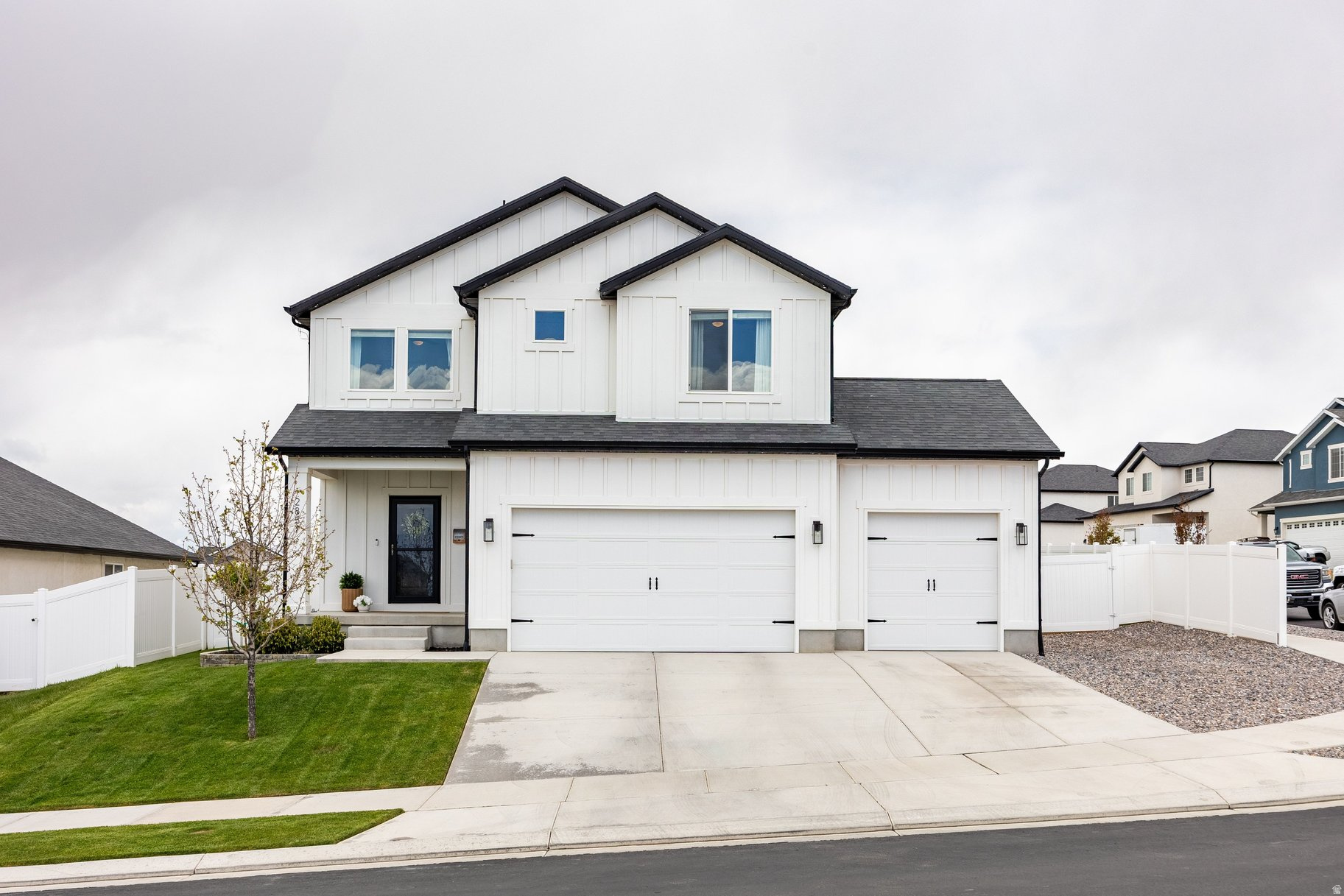 Welcome to 2857 Carriage Hill Drive, a beautifully upgraded and fully finished home in the heart of Eagle Mountain City Center, just minutes from everyday conveniences like Macey's and surrounding amenities. As you move through the entry hallway, the home opens up to reveal its true showstopper, a stunning two story fireplace that anchors the main living space and creates an inviting, elevated atmosphere. It is the kind of feature that instantly makes the home feel both grand and warm at the same time. Throughout the home, you will notice thoughtful upgrades that go far beyond typical builder finishes. Custom wall treatments, built in cabinetry, and carefully selected details bring character and depth to each space, creating a polished and cohesive feel. The main level also features a dedicated office with french doors, ideal for working from home or creating a quiet retreat. Upstairs, you will find four spacious bedrooms including a large primary suite with an en suite bath, along with the convenience of an upstairs laundry room. The fully finished basement is designed for both everyday living and entertaining. Enjoy a true home theater experience with built in surround sound, a projector, and a 120 inch screen for movie nights. There is also a dry bar, full bath, and two additional rooms currently set up as a gym and playroom, offering flexibility to fit your needs. Outside, everything is already done for you. The backyard is fully finished and features a massive concrete patio with a gazebo, perfect for hosting or relaxing. The trampoline and playground are included, adding even more to enjoy right away. There is also an RV pad and a spacious three car garage. The location offers the best of both convenience and adventure. You are close to daily essentials while also being surrounded by hiking, biking, and off road trails that make it easy to get outside and explore. Nearby education options include John Hancock Charter School, located just minutes from the home. With a fully finished interior and exterior, extensive upgrades, and a prime location, this home offers a level of value that is hard to find when compared to nearby new construction. No waiting, no added expense, just move in and enjoy from day one.