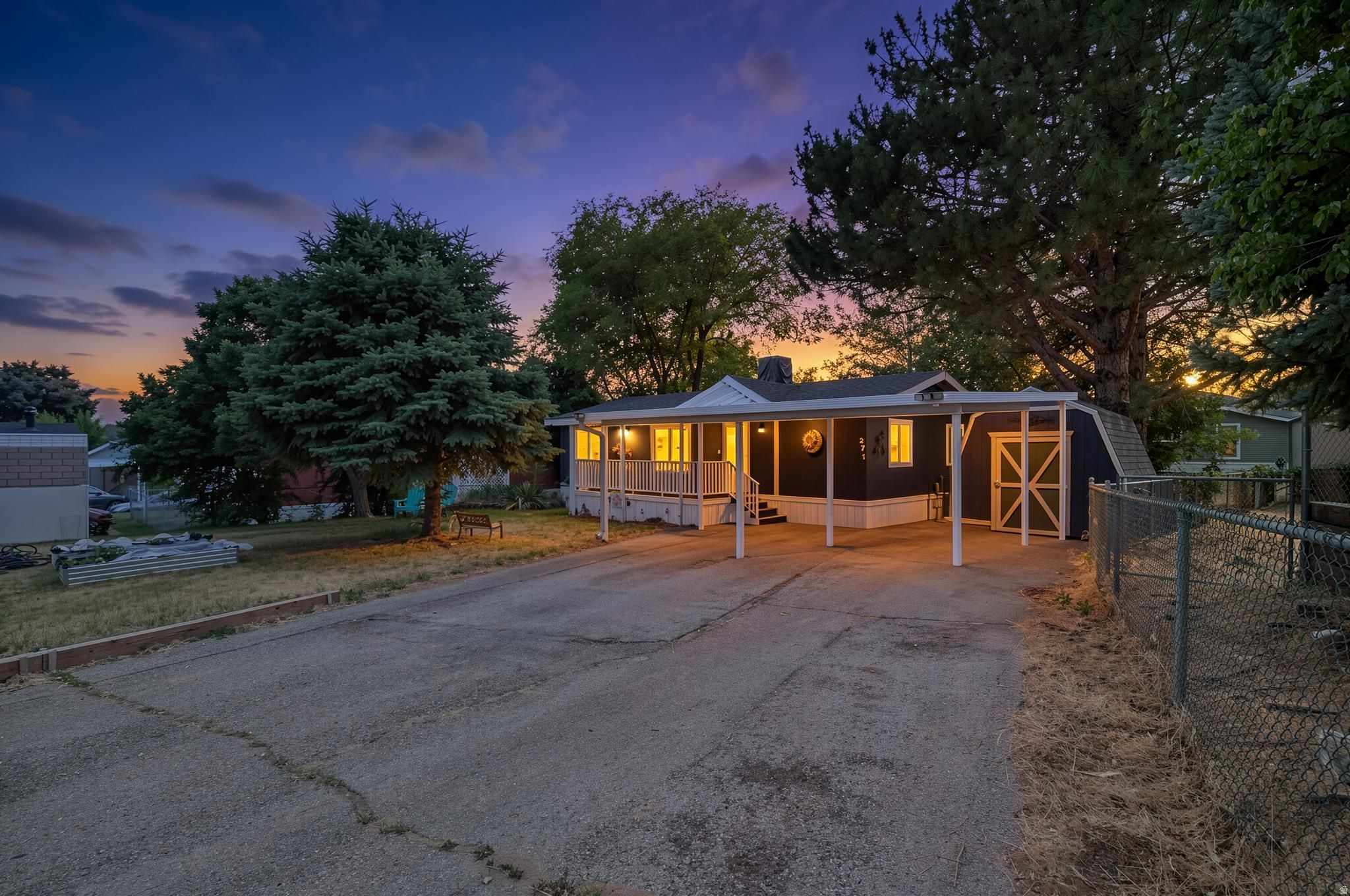 This home has been exceptionally well cared for and offers a comfortable layout that's ready for its next owner. To make your move even easier, the home includes 3 TVs and all bedroom sets and the seller is willing to negotiate the remaining furniture. Enjoy relaxing or entertaining year-round on the covered deck, while the fully fenced backyard provides added privacy and space for pets, gardening or outdoor gatherings. Additional uncovered parking offers plenty of room for extra vehicles and guests. Don't miss your chance to own this well-maintained home-schedule your private showing today!   The mobile home is currently occupied. Please provide at least 24 hours' notice for all showing requests. The seller prefers to schedule showings on weekends only. The seller and/or the listing agent must be present during all showings. Square footage figures and taxes are provided as a courtesy estimate and the buyer is advised to obtain an independent measurement.