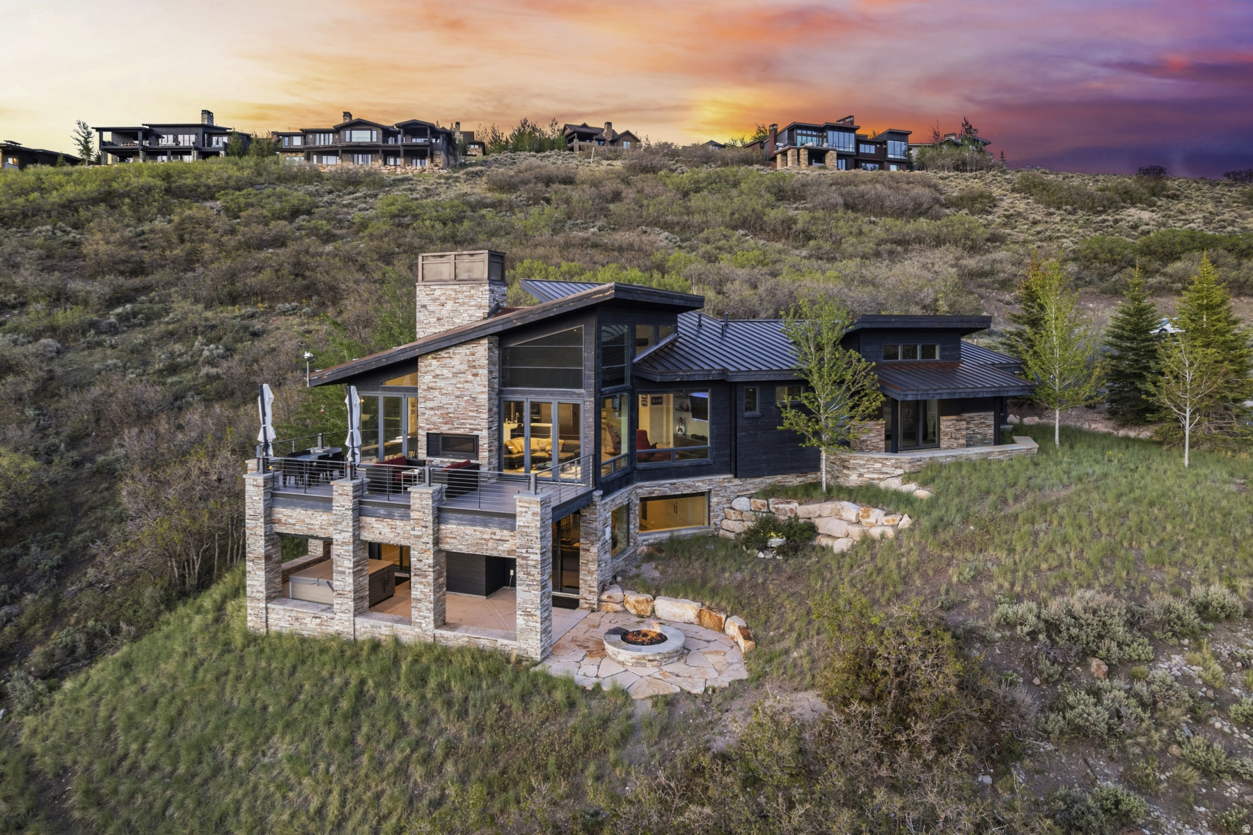 Forever Views at 7,000 Feet in Promontory -- Perched at 7,000 feet in the prestigious Promontory Club, this extraordinary mountain retreat lives like you're floating above the clouds. Set on a massive and rare 2.79-acre homesite with guaranteed privacy and no future construction to block your panoramic, forever views, this is a true legacy property. Built by Sherman Construction and thoughtfully designed by Darling Architecture, the 4,688 square foot home blends timeless mountain architecture with refined modern comfort. Featuring 4 spacious bedrooms, a dedicated wine room, a private theatre, and a view-inspired workout room, every space is crafted for elevated living and effortless entertaining. Walls of glass frame the jaw-dropping scenery, seamlessly connecting indoor elegance to stunning outdoor living areas designed for sunset gatherings, peaceful mornings, and star-filled nights. The oversized 3-car garage provides ample room for mountain toys and gear, while thoughtful design makes everyday living effortless. Located in an established neighborhood just minutes from Promontory's main gate, convenience meets serenity in one of Park City's most coveted private communities. Enjoy the peace of mind that comes with gated security, impeccably maintained roads, and a true sense of neighborhood connection. A Social Membership is available, opening the door to world-class amenities, dining, golf, fitness, spa experiences, and year-round adventure--all just moments from your front door. Whether you're seeking a full-time mountain sanctuary or a luxurious lock-and-leave escape, this home offers the ultimate ease of life: privacy, space, security, and low-maintenance luxury surrounded by nature. This is elevated mountain living at its finest in Promontory.