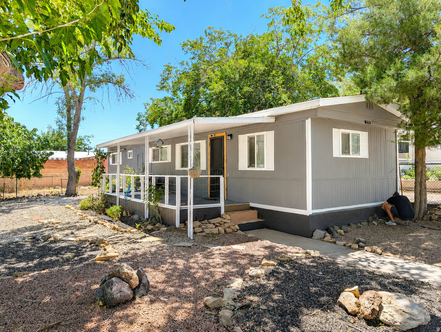 Well Maintained 2-bedroom, 1-bathroom mobile home, nestled on a spacious corner lot. Surrounded by mature trees, this property offers the ultimate in privacy and serenity, with a fully fenced yard perfect for relaxation or entertaining. Semi-furnished, the home combines comfort with convenience. Additional features include ample underground storage and Storage shed for your belongings. Located just 20 minutes from the breathtaking Zion National Park, this home is a rare opportunity to enjoy luxury living in an idyllic setting.