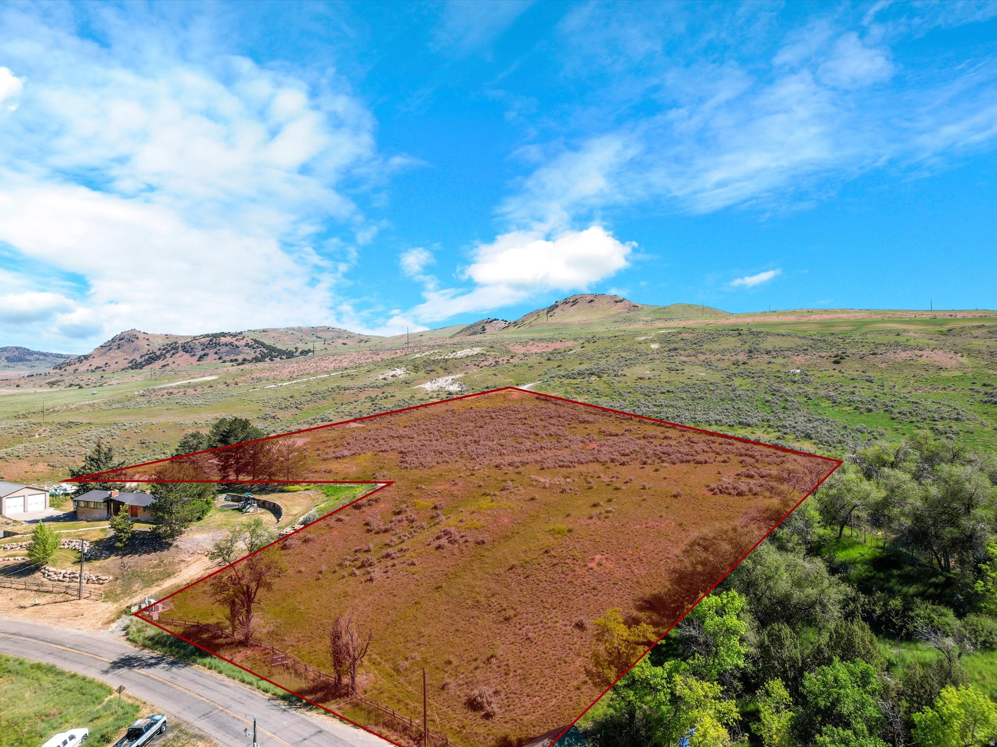 Incredible opportunity to own a premier 4.43-acre parcel in the scenic community of Beaver Dam. This expansive, ready-to-build lot offers the perfect canvas for a custom estate, ranchette, or agricultural property, complete with breathtaking valley and mountain views. Buyers can bypass the usual development delays and administrative hurdles, as the seller has already secured official approval from local utility providers to bring power, natural gas, and culinary water directly to the property. Adding immense value to this rare offering, essential water rights are conveyed with the sale, providing security for future landscaping, livestock, or agricultural endeavors. The generous acreage provides ample space for a large custom residence, detached shops, barns, and pastures, all while maintaining excellent privacy and open space. Situated within easy driving distance of Tremonton, Logan, and Interstate 15 access, this property perfectly balances peaceful rural living with modern convenience. Bring a preferred builder and explore the massive potential of this fully prepared acreage.