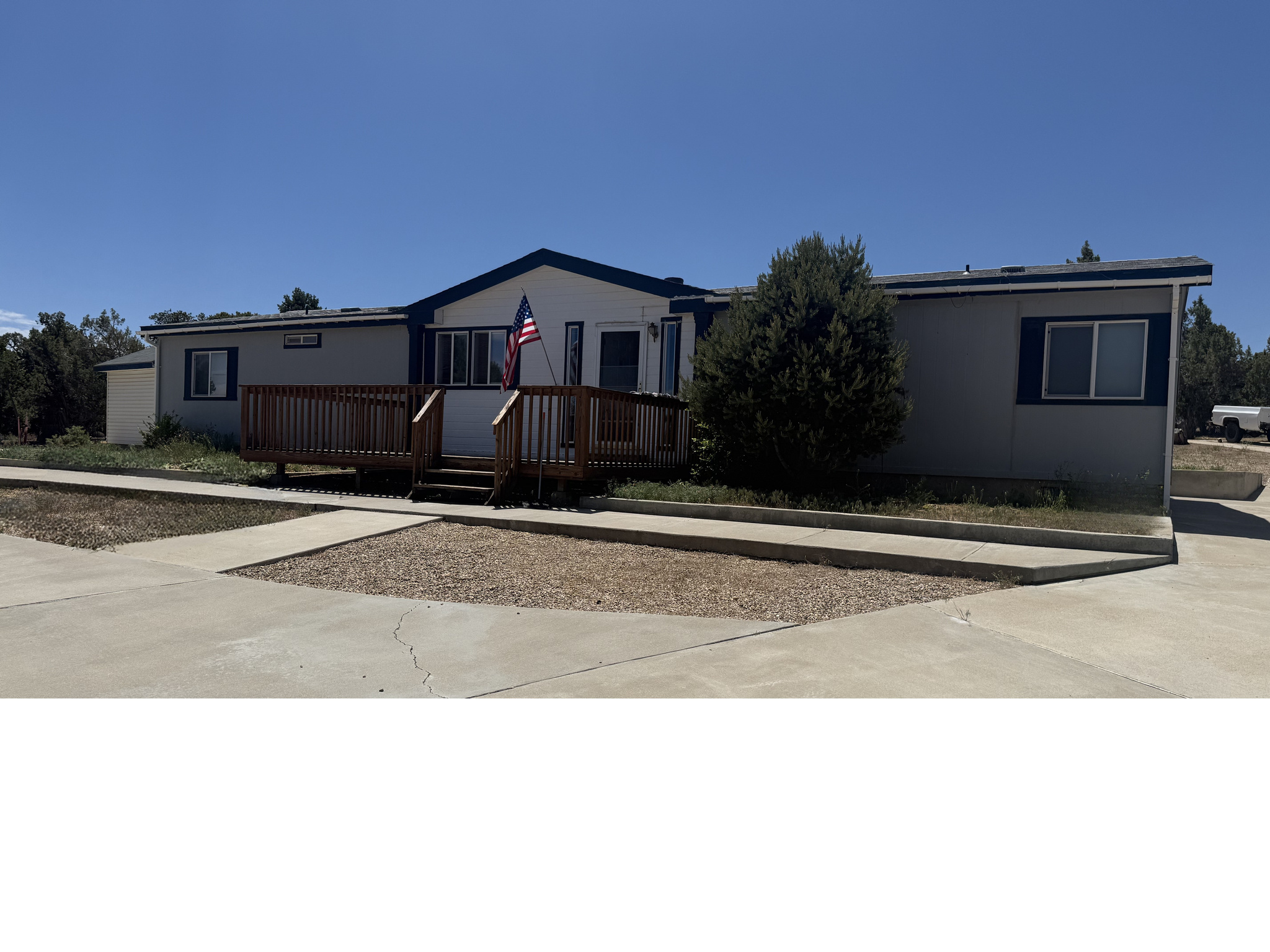 This getaway is the place to be!! With 3 bedrooms, 2 bathrooms, a den and spacious kitchen living room, raised concrete flower gardens in front and back and 3 car garage. and 2 rv pads with power, 3 sheds - 1 metal garage for a boat 12'x16' on concrete, there is a 2,000 gallon water shed for you to store the water you bring onto the property, propane tank,  power connected. septic, no water. With year-round access and close proximity to fishing, boating, snowmobiling, and hiking, this property is perfect as a full-time residence, vacation getaway, or recreational base camp. **exclusion of sale :: video cameras