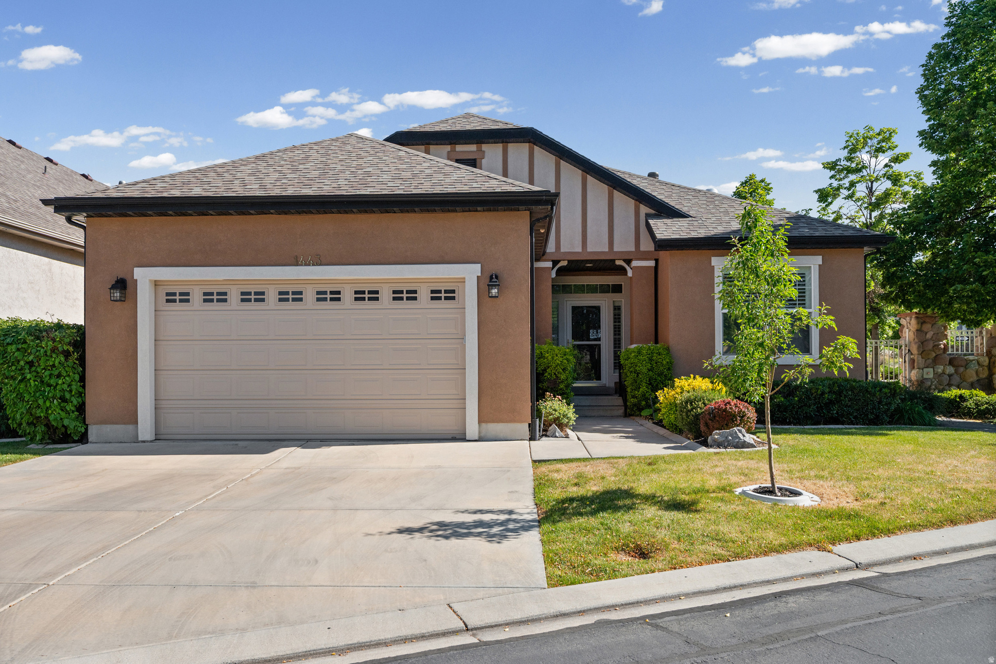 Welcome home to this impeccably maintained Reunion Glen gem, thoughtfully upgraded and move-in ready! The beautifully appointed kitchen features rich cherry wood cabinetry (2020) and flows seamlessly into the inviting great room, creating the perfect open floor plan for everyday living and entertaining. A cozy gas fireplace with blower anchors the great room, while LVP flooring and plantation shutters add warmth and elegance throughout the main level. The private primary suite is a true retreat, boasting a separate tub and shower, double sinks, and a generous walk-in closet. A dedicated main-floor office with built-in cabinetry offers the perfect work-from-home setup, with style and storage to spare. Enjoy the peaceful, low-maintenance yard with HOA handling mowing and trimming for you! The spacious basement offers 2 bedrooms, 2 storage rooms, and a charming under-stair play area. One of the bedrooms is currently used as a craft room, complete with built-in cabinetry, and can easily be converted back to a bedroom to suit your needs. Outdoor living shines with a concrete patio featuring a BBQ stub, plus the side of the property has been beautifully upgraded with maintenance-free flagstone pavers, complete with a drain system, perfect for effortless entertaining. Nestled in a desirable gated community with a clubhouse, pool, and hot tub, conveniently located right across from the pool, with plenty of guest parking. Additional upgrades include a whole-home surge protector, 24 kW whole-house backup gas generator, insulated garage door with attic storage, 2020 50-gallon water heater, 95% efficiency furnace with humidifier, and a security system with interior motion sensors.