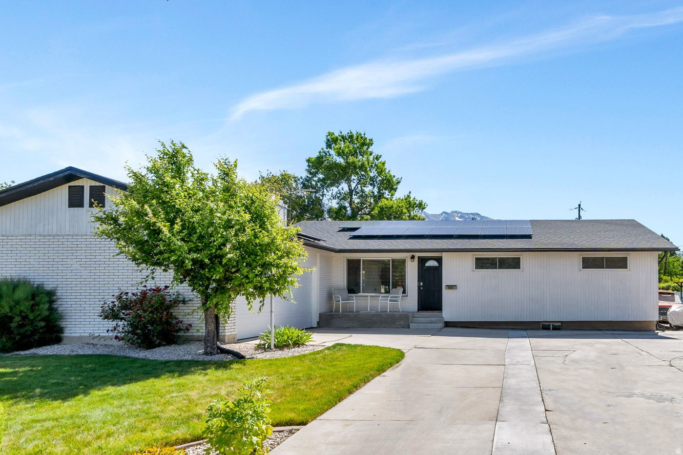 Beautifully maintained 5-bedroom, 3-bathroom rambler located in a desirable American Fork neighborhood. This home offers a bright, open layout with multiple gathering spaces, a dedicated office or optional bedroom, and a spacious kitchen designed for both everyday living and entertaining. The fully equipped basement apartment features a separate entrance, providing excellent flexibility for rental income, multigenerational living, or extended guest accommodations. Additional upgrades include paid-off solar panels for improved energy efficiency, a new roof installed in 2022, and a new water main line completed in 2023. The spacious backyard includes a patio area perfect for outdoor dining, entertaining, and relaxing summer evenings. Conveniently located just minutes from shopping, dining, schools, parks, and easy freeway access.