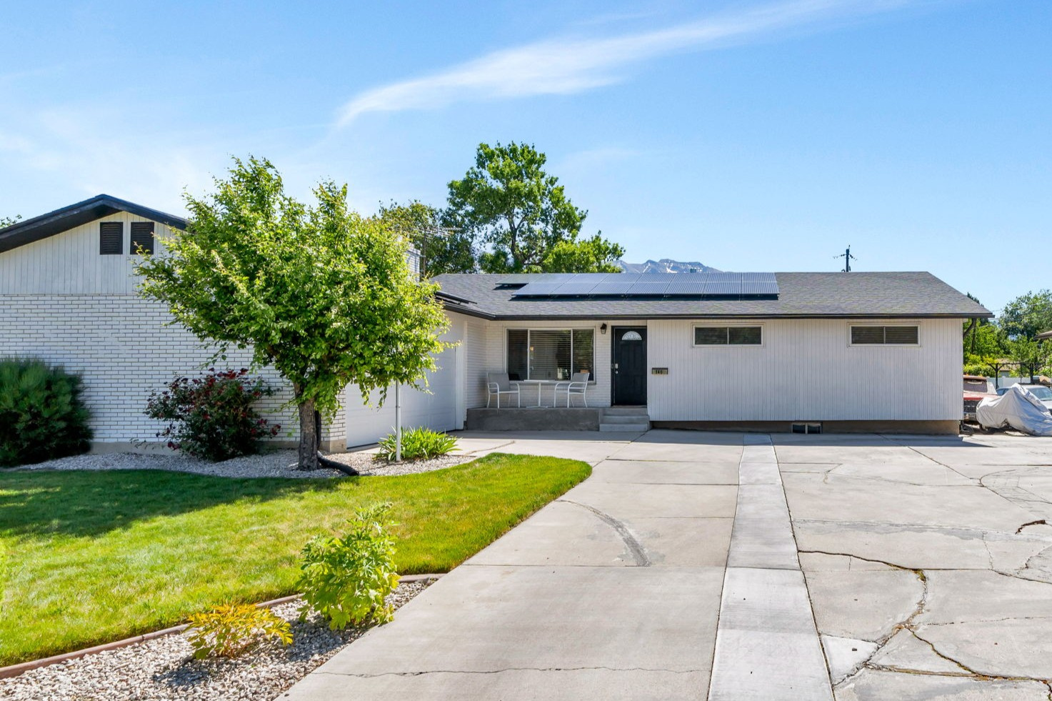 Beautifully maintained 5-bedroom, 3-bathroom rambler located in a desirable American Fork neighborhood. This home offers a bright, open layout with multiple gathering spaces, a dedicated office or optional bedroom, and a spacious kitchen designed for both everyday living and entertaining. The fully equipped basement apartment features a separate entrance, providing excellent flexibility for rental income, multigenerational living, or extended guest accommodations. Additional upgrades include paid-off solar panels for improved energy efficiency, a new roof installed in 2022, and a new water main line completed in 2023. The spacious backyard includes a patio area perfect for outdoor dining, entertaining, and relaxing summer evenings. Conveniently located just minutes from shopping, dining, schools, parks, and easy freeway access.