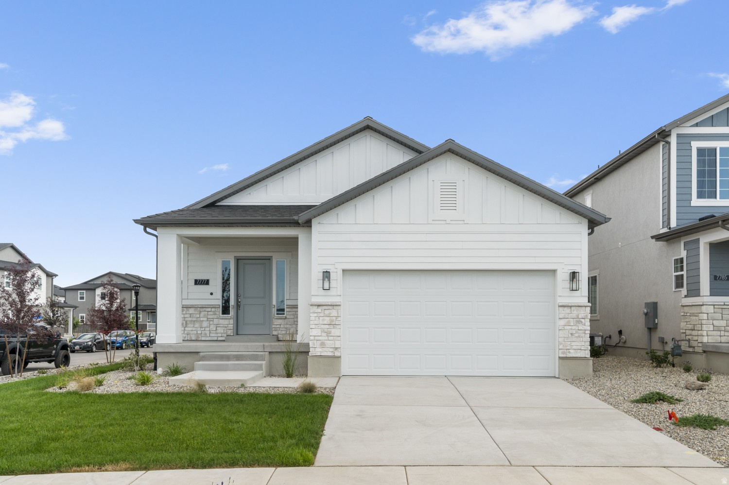 Come see this thoughtfully designed brand new Covington home! Featured you will find a stylish kitchen with crisp white laminate cabinets, elegant quartz kitchen countertops, and a full suite of stainless steel gas appliances. The interior is finished with a blend of laminate hardwood, vinyl tile, and carpet flooring, offering both style and comfort. A tankless water heater and energy-efficient features ensure modern convenience throughout. The owner's bathroom boasts a spacious walk-in shower with sleek glass doors, complemented by brushed and satin nickel hardware. Finished with Craftsman-style base and casing for a classic architectural touch, this home blends functionality with timeless design. Comes fully landscaped and maintained by the HOA for easy care, hassle free living!
