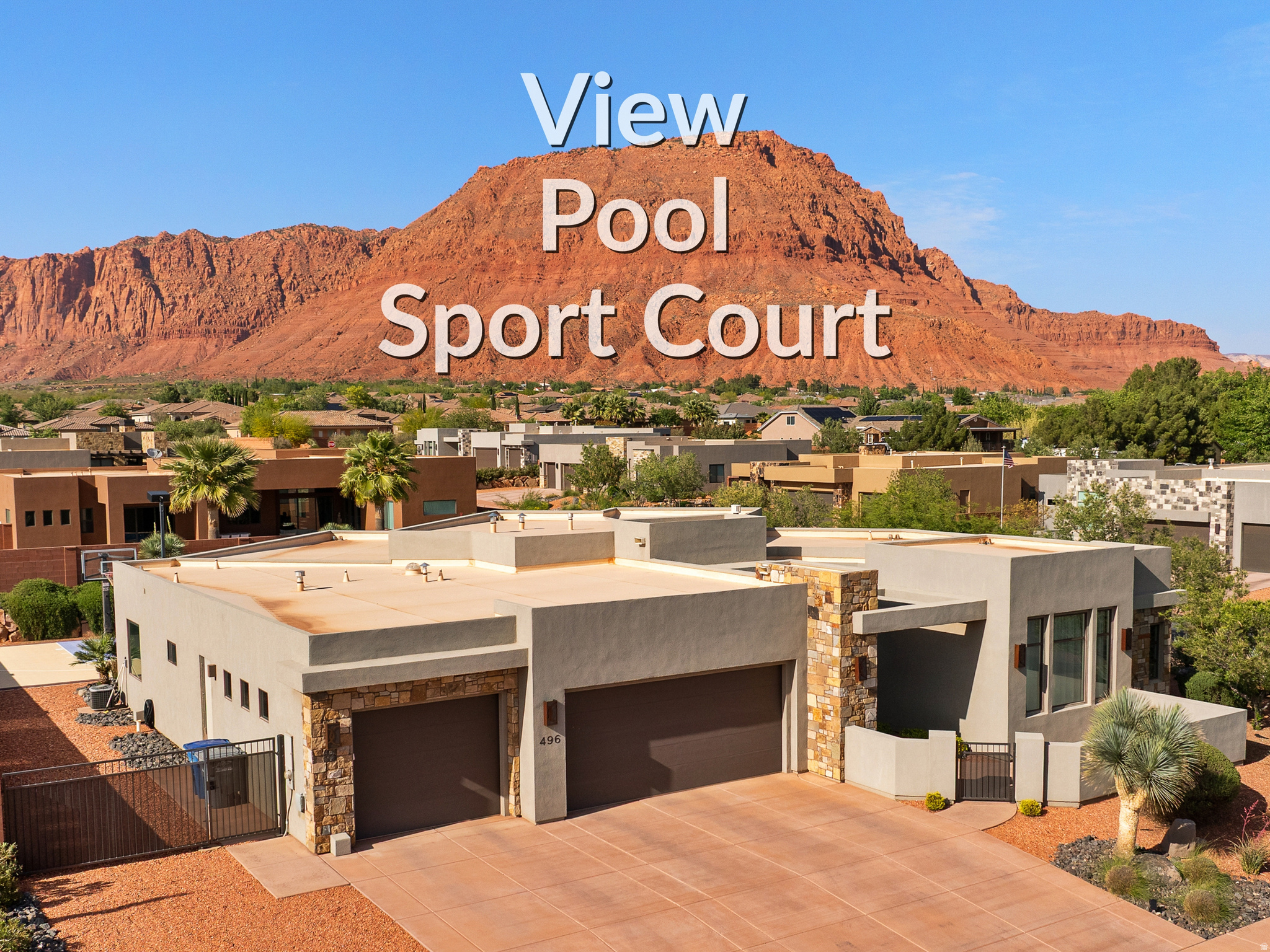 Panoramic Red Cliff Views. Resort-Style Living. Wake up each morning to glowing Southern Utah cliffs framed by walls of glass, then step outside to your private backyard paradise. Slip into the crystal-clear pool, unwind in the spa beneath a cascading waterfall, or shoot hoops on your own sport court. Just minutes from Snow Canyon, your days can start with a sunrise hike or bike ride and end poolside under painted desert skies. Inside, a chef-worthy kitchen and sleek, modern finishes elevate every moment. Fully fenced for privacy but designed for connection--this is more than a home, it's a lifestyle. A furniture package is available. Call for details.