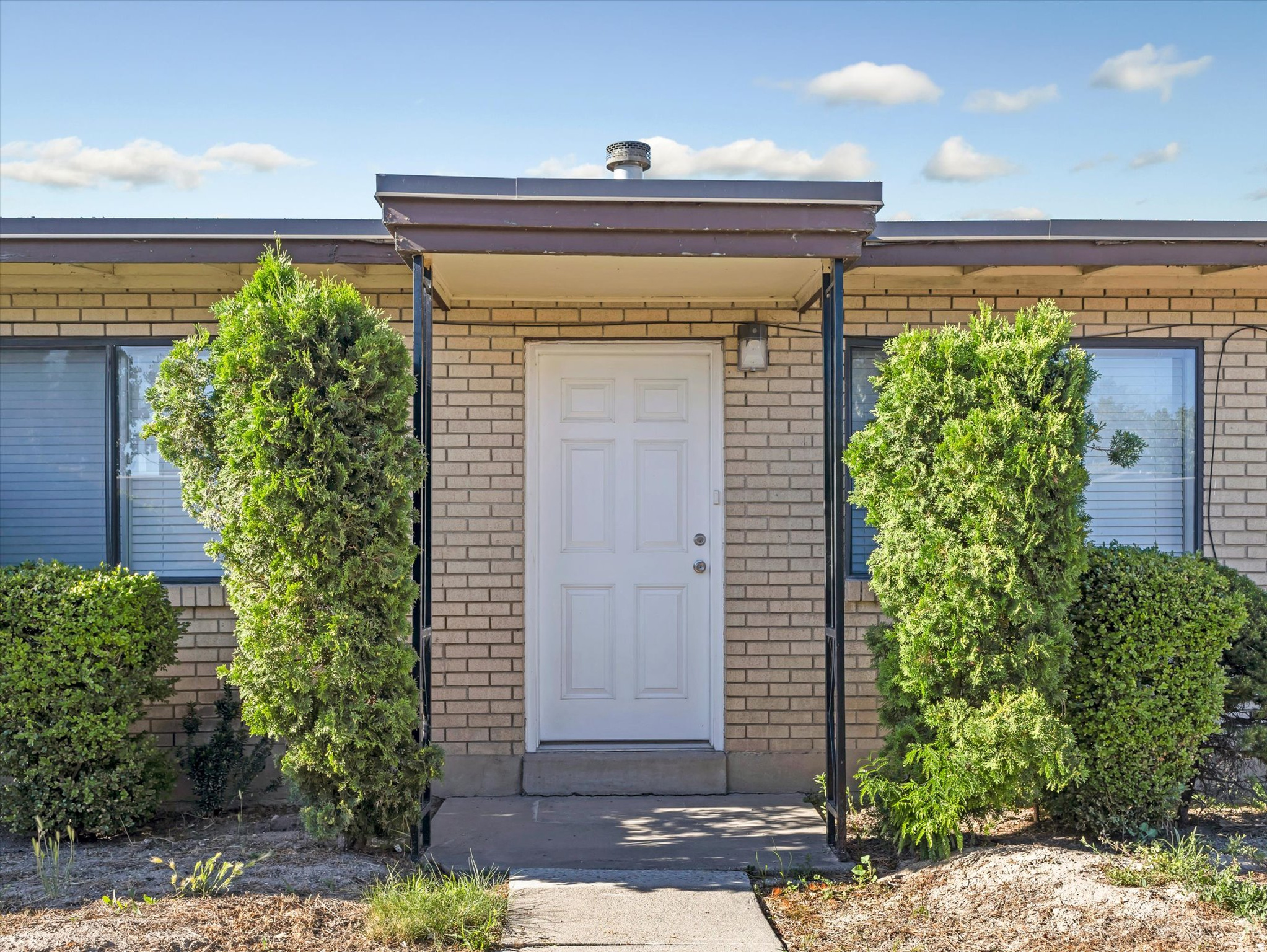 Welcome to 3524 W Ridge Dr, where comfort, convenience, and value come together in a beautifully refreshed home tucked into a peaceful, established neighborhood. Step inside and enjoy fresh updates throughout that create a bright, clean, move-in-ready feel while maintaining warmth and functionality. Thoughtful improvements pair with an efficient layout to make everyday living easy and comfortable. One of the standout features of this home is the fully fenced and enclosed outdoor space - a rare extension of the living area that offers privacy while remaining low maintenance. The covered patio creates a comfortable setting for relaxing mornings, outdoor dining, relaxing evenings, or entertaining guests, while the fenced layout provides separation and a cozy feel without the upkeep of a large yard. The attached 1-car garage adds convenience with covered parking and additional storage flexibility. Location is where this property truly shines. Situated in a quieter residential pocket of West Valley City, this home offers excellent access to major commuter routes while keeping everyday living convenient and connected. Enjoy being just minutes from Shopping, Downtown Salt Lake City, I-215, dining, entertainment, and events which are easily accessible. Outdoor enthusiasts will appreciate close proximity to StoneBridge and Glendale Golf Course and nearby parks and recreation opportunities, while continued growth and investment throughout the Salt Lake Valley add to the long-term appeal of the area. Whether you're searching for a first home, low-maintenance living, or an opportunity in a location that balances accessibility with comfort, 3524 W Ridge Dr delivers exceptional value in a convenient and established community.
