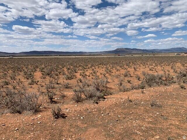 Don't miss out on this very well priced 20 plus acreage!! Great area with mountain views in every direction. You will have privacy with no close neighbors. Enjoy the wildlife around you. Horses are allowed so perfect for a mini ranch. If you enjoy the outdoors you can take advantage of being 20 minutes to Brian Head ski resort for skiing in the Winter. Hike & bike in the Summer This property puts you close to Bryce Canyon, Zion & Cedar Breaks Parks. You can go fishing in any direction. Cedar City is just minutes away. You will have many opportunities to make this property your own
