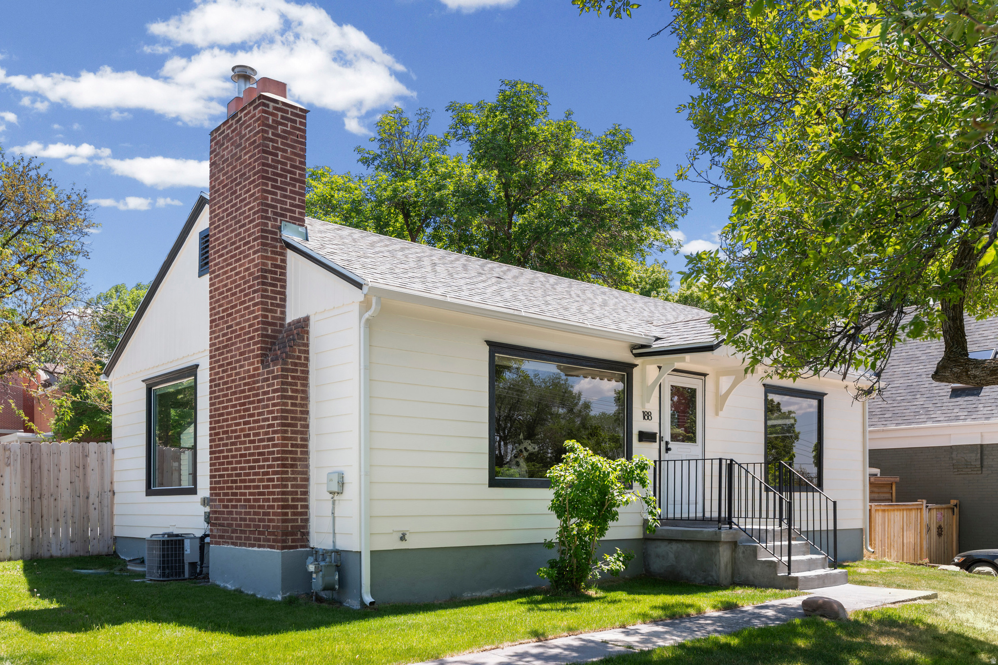 Charming Avenues Home | 4 Bed / 2 Bath | 1,775 Sq Ft | Corner Lot | 2-Car Garage | SLC Welcome to one of Salt Lake City's most beloved neighborhoods of the historic Avenues, where tree-lined streets, architectural character, and walkable city living come together in a way that's genuinely hard to find anywhere else. This 4-bedroom, 2-bath single-family home sits on a corner lot and has been meticulously cared for and thoughtfully updated inside and out.  A brand new kitchen and fully updated bathrooms mean the most important spaces have already been beutifully done. The updated exterior and new roof give the home wonderful curb appeal with a nod toward Cape Cod charm that fits right into the timeless character of the Avenues. At 1,775 square feet, the layout is comfortable and functional, with the basement offering flexible living options. (Previously configured as a separate mother-in-law apartment, it could easily be converted back by simply closing off the interior stairs, which is a nice bonus for multigenerational living or rental income potential down the road. One of the most coveted features of this property is the rare 2-car garage . We all know that's a genuine rarity in this part of the city. While the lot size is typical of the Avenues (cozy and charming by design) it makes exceptional use of every square foot. A rare 2-car garage, additional driveway parking, a covered patio, and green space all fit comfortably on the property, which is a genuine feat for this part of the cityCorner lot positioning adds extra light, privacy, and access. Step outside and directly across the street awaits 120 acres of peaceful, park-like green space: the Salt Lake City Cemetery, offering a quiet, open backdrop that most urban homes can only dream of. And behind the home? A quiet, rarely used church that keeps the back of the property just as peaceful and private as the front. No busy neighbors, no noise, aside from the birds. Quiet in every direction, serene views, and a neighborhood that feels tucked away while being minutes from everything the city has to offer. Quiet. Convenient. Charming. Updated. This is the Avenues at its best.  Sale of this home is part of a 1031 Exchange.