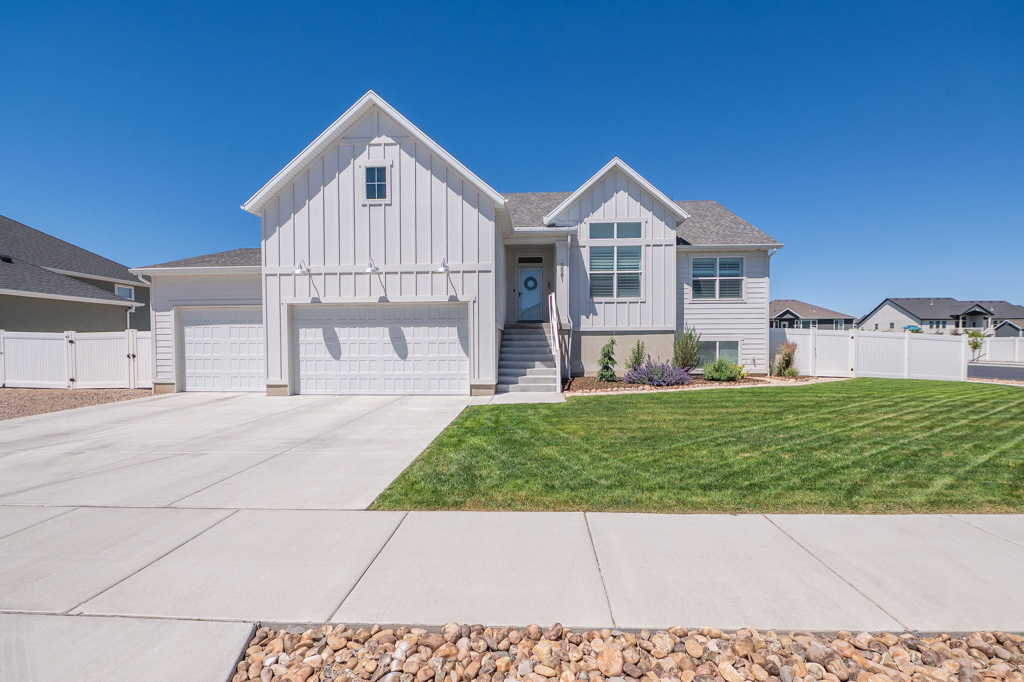 *OPEN HOUSE Saturday, June 20th 1-3 pm* Assumable 4.625% VA Loan! Why wait to build when you can have the upgrades, space, and landscaping already done? Located in the desirable Green Farm community, this beautifully finished Rambler with single-level living offers over 3,200 square feet of thoughtfully designed living space with main-level living, a recently fully finished basement, and room for all your toys (double RV parking pad in backyard). The open-concept layout flows seamlessly into the dining and living spaces, highlighted by tray ceilings, plantation shutters, custom shiplap accents, and abundant natural light. The heart of the home is the spacious kitchen featuring white cabinetry, quartz countertops, island, a gas range, walk-in pantry, and all appliances included + washer & dryer.  The main-level primary suite complete with a large walk-in closet, dual vanities, separate soaking tub, and walk-in shower. A practical mudroom with built-in bench and hooks helps keep everyday life organized. Brand new carpet upstairs. Downstairs, the newly finished basement provides tons of character and charm (wet bar features butcher )as well as additional living space perfect for entertaining, guests, hobbies, or a home theater. 50 gallon water heater and water softener already installed. Outside, you'll enjoy a fully fenced yard, a 3-car garage, and oversized RV parking with plenty of room for trailers, campers, boats, and recreational vehicles. Situated near walking trails, pickleball courts, parks, and open space, this home combines convenience, recreation, and comfort in one of West Haven's most sought-after neighborhoods. This isn't just a home-it's the opportunity to enjoy the benefits of newer construction without the wait, expense, or hassle of completing the upgrades yourself. Don't wait, make this house your home!!