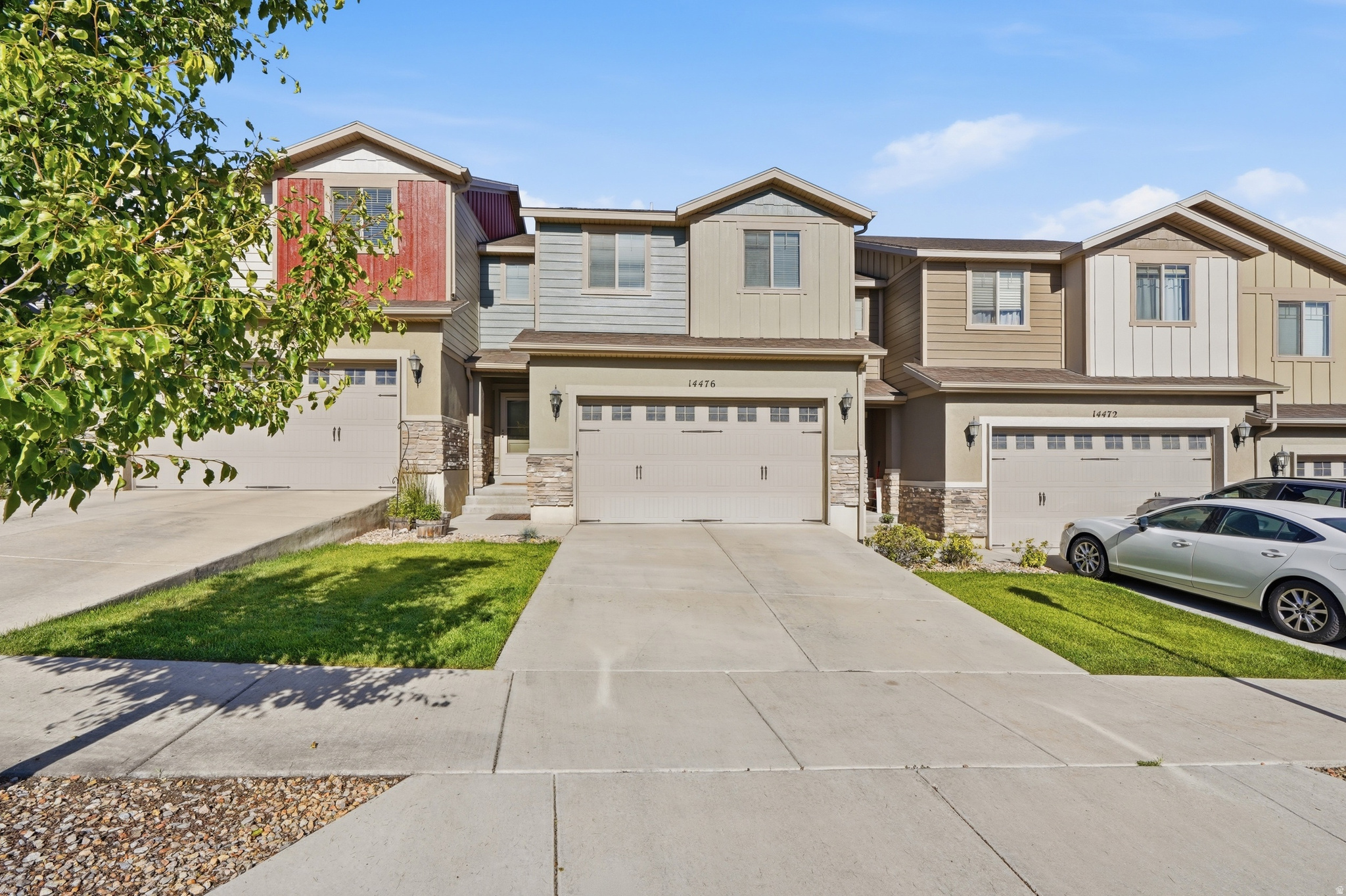 Welcome home to one of Herriman's most desirable townhome communities! This beautifully maintained home offers the perfect combination of comfort, style, and convenience. Recent updates include new laminate flooring throughout the main level, staircase, and upper hallway, creating a modern, cohesive look and reducing carpet in high-traffic areas.  The open-concept floor plan is bright and inviting, with abundant natural light and a spacious layout designed for both everyday living and entertaining. One of the home's standout features is the expansive open green space directly behind the property, providing a rare sense of privacy and a peaceful setting to enjoy year-round.  Residents enjoy access to outstanding community amenities, including a beautiful clubhouse, swimming pool, hot tub, fitness center, and an extensive network of walking trails. Ideally located just minutes from Mountain View Village, you'll enjoy convenient access to shopping, dining, entertainment, and everyday necessities.  Move-in ready and ideally situated in a highly sought-after community, this is an opportunity you won't want to miss!