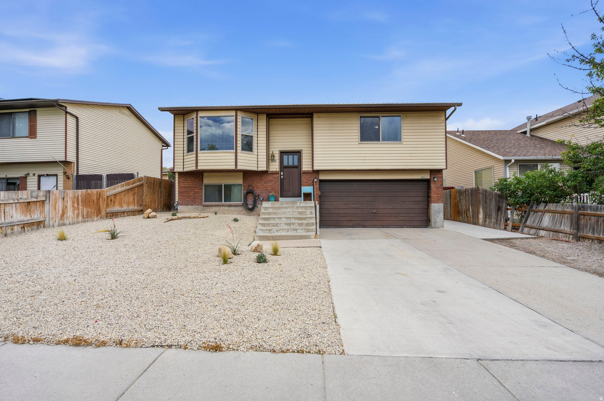 **OPEN HOUSE~ Saturday, July 11 from 11-2pm** Quality updates. Comfortable living. Exceptional value. Come see why this West Jordan home deserves a spot at the top of your list. Finding an updated, move-in ready home at an exceptional value isn't always easy-but this one delivers. Welcome to this beautifully, refreshed 3-bedroom, 2-bath home. Thoughtfully remodeled kitchen truly becomes the heart of the home offering a modern, inviting space for everyday living and entertaining as it opens to the family room with a large window letting in abundant natural light and mountain views. Updated, main level bath offers generous space with double sinks and plenty of storage. Enjoy evenings on the back deck or "slide on down" to the grassy yard for s'mores and stories around the fire pit. Whether you're buying your first home, simplifying your lifestyle, or looking for a smart investment, this is a home that simply makes sense. Sand box on west side of home will stay and could be converted to flower or garden bed. Fencing under deck stays for additional storage or dog run area. Shed stays. Xeriscaped front yard for easy maintenance and low watering. West Jordan City now allows Short Term Rental with approved permit. Looking for a little hobby farm? West Jordan City allows 4 dogs and 4 cats, along with 5 egg laying hens plus no more than 5 chicks, and 3 other fowl. Buyer to verify all information including zoned uses and square footage.